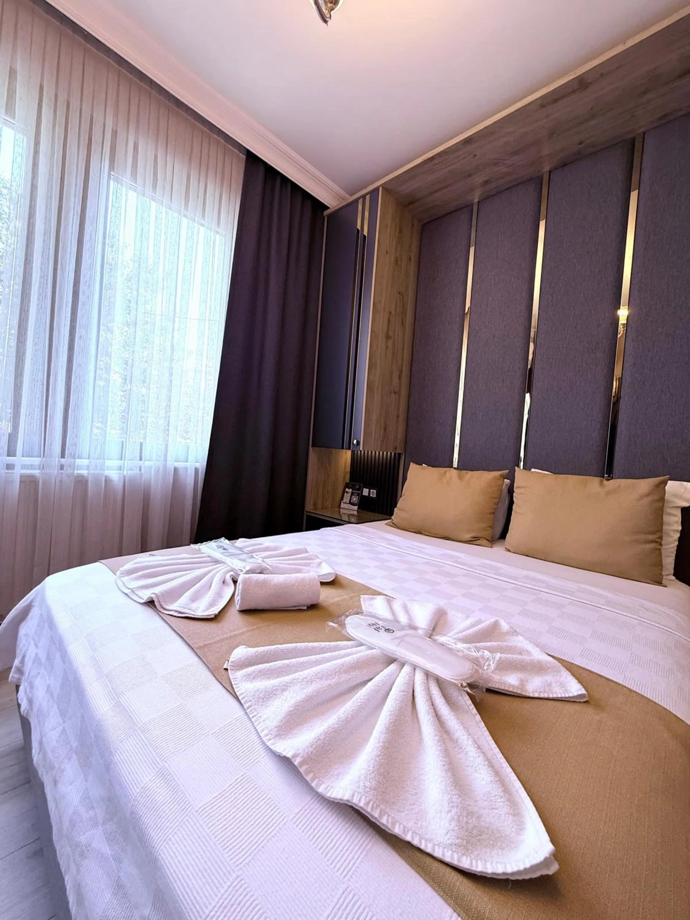 Bed in New Taksim Hotel