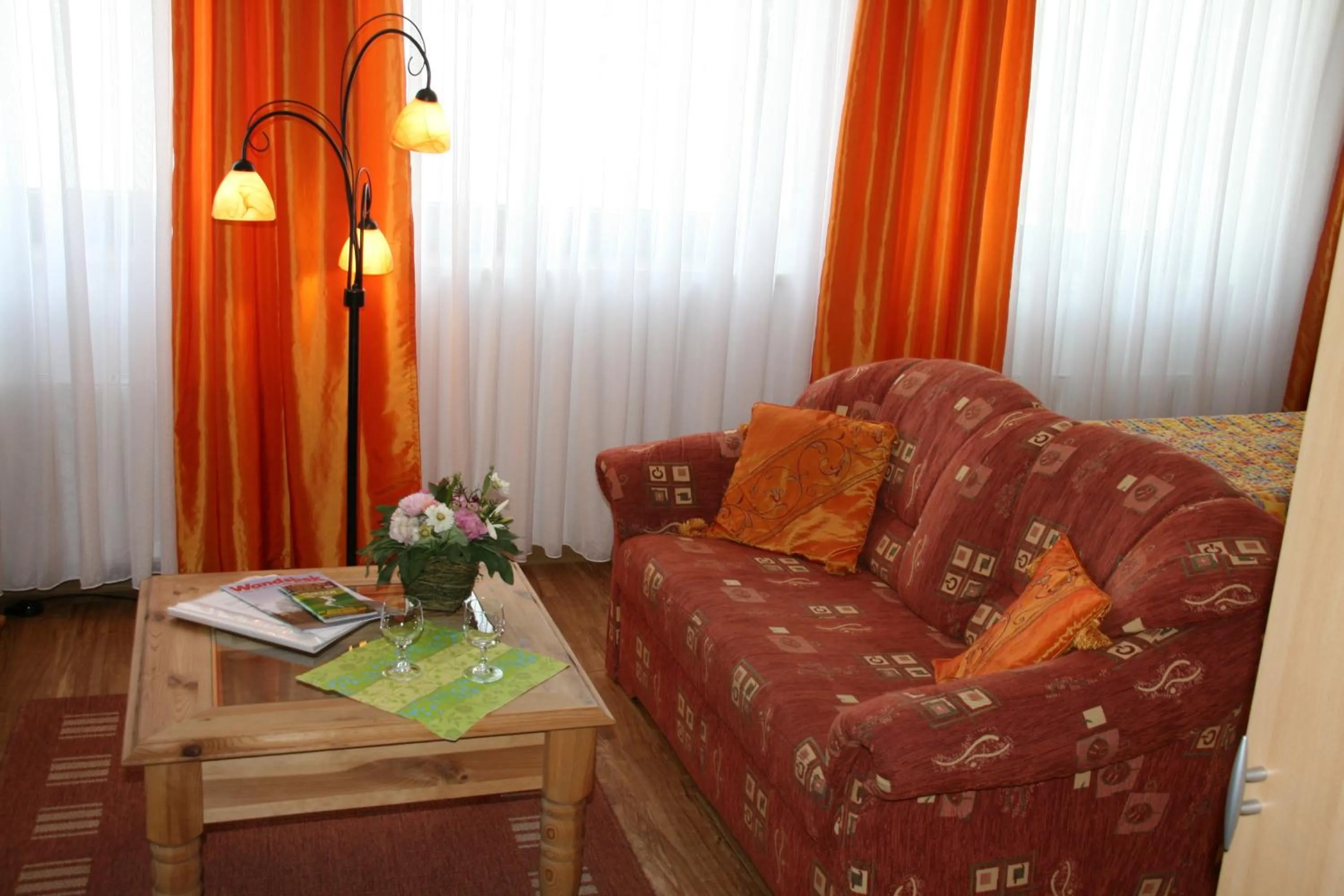 Seating area in Albertus Paris Aparthotel