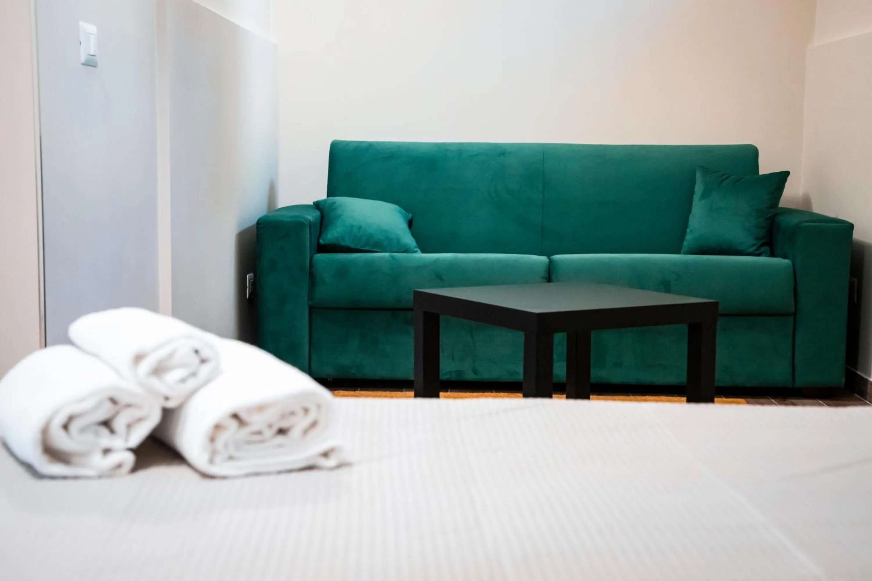 Bed, Seating Area in Khome Giardini Naxos