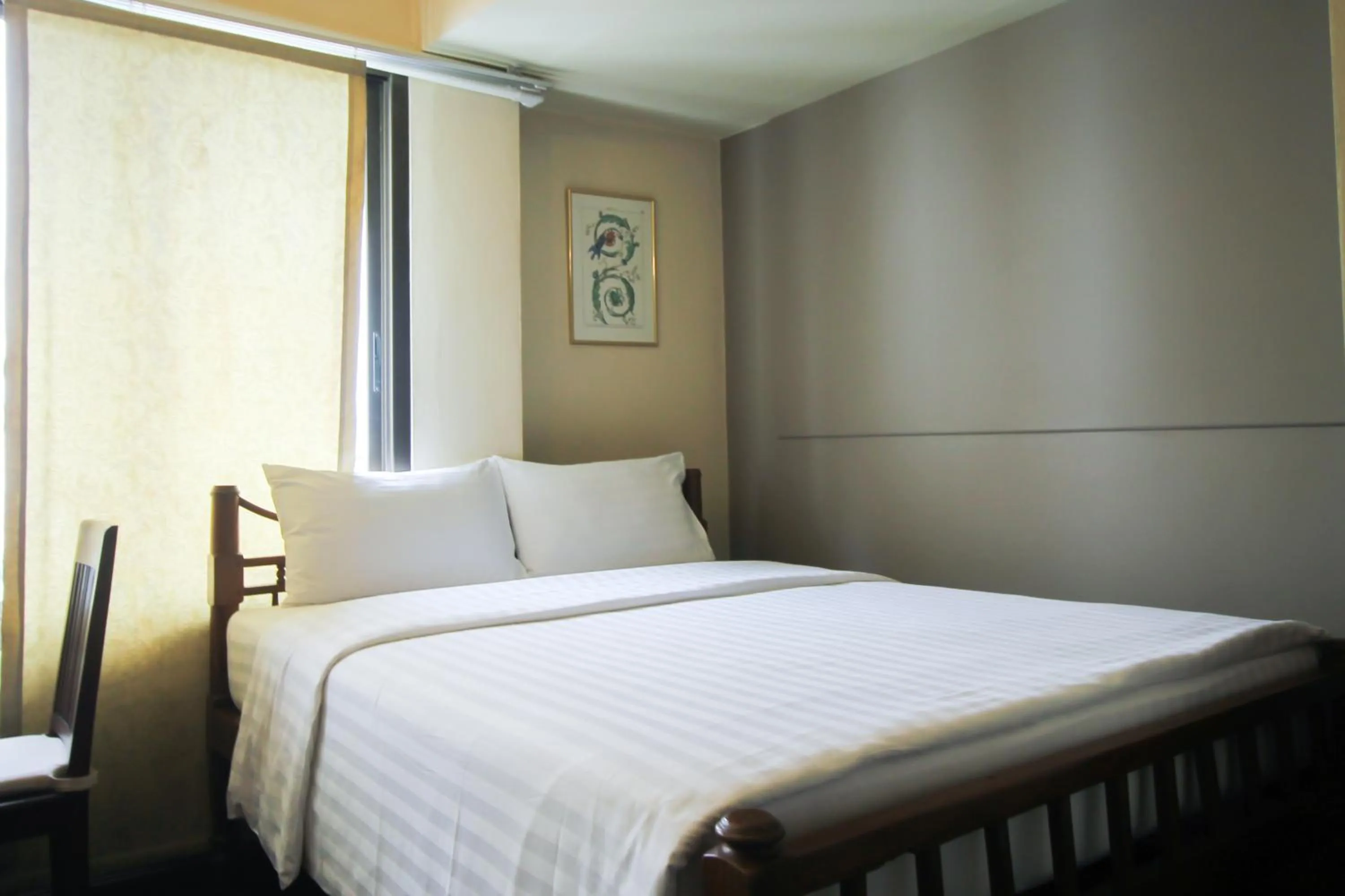 Bed in Sourire at Rattanakosin Island Hotel