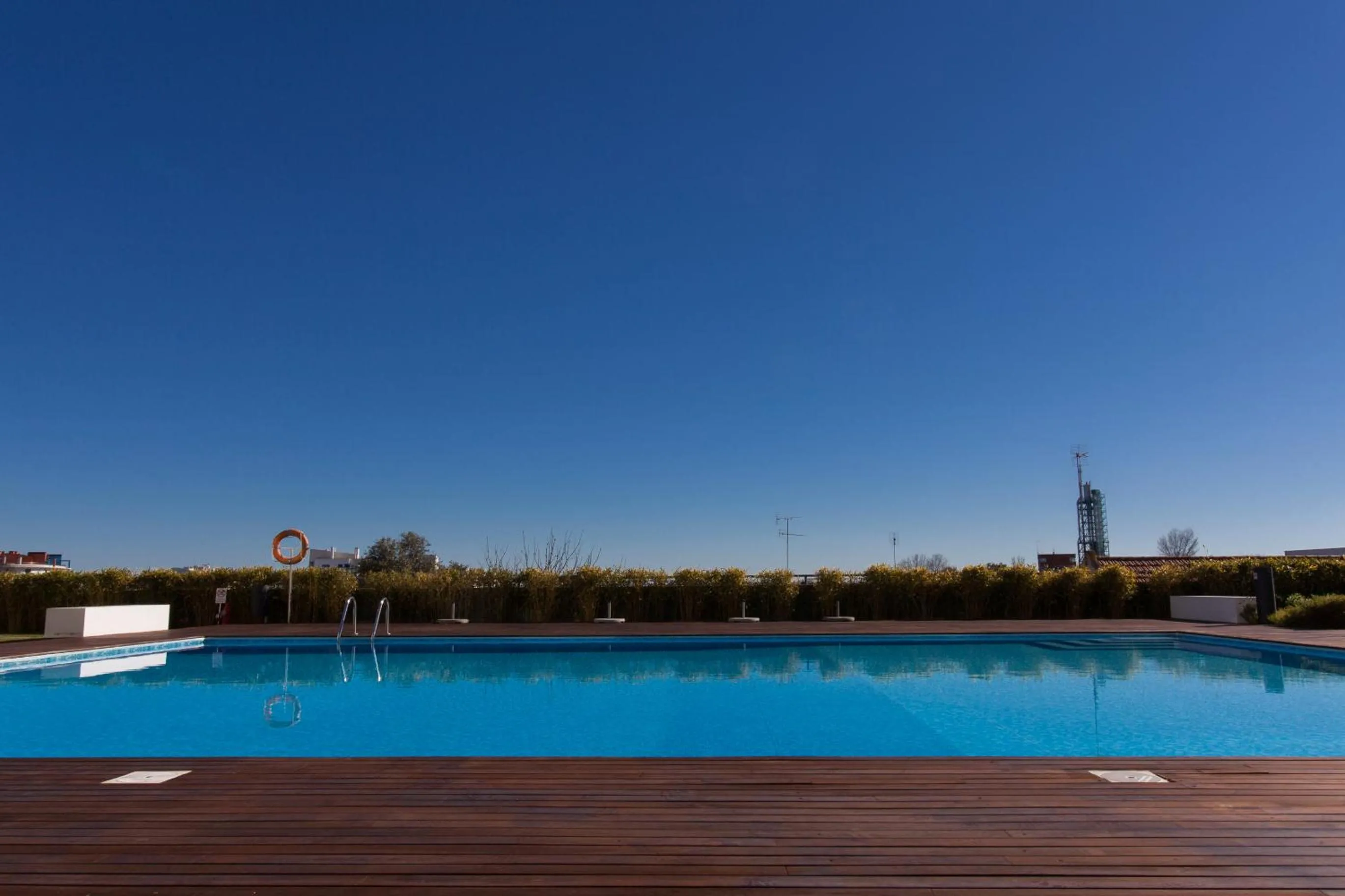 Swimming pool in Charming Apartment with Balcony & Pool
