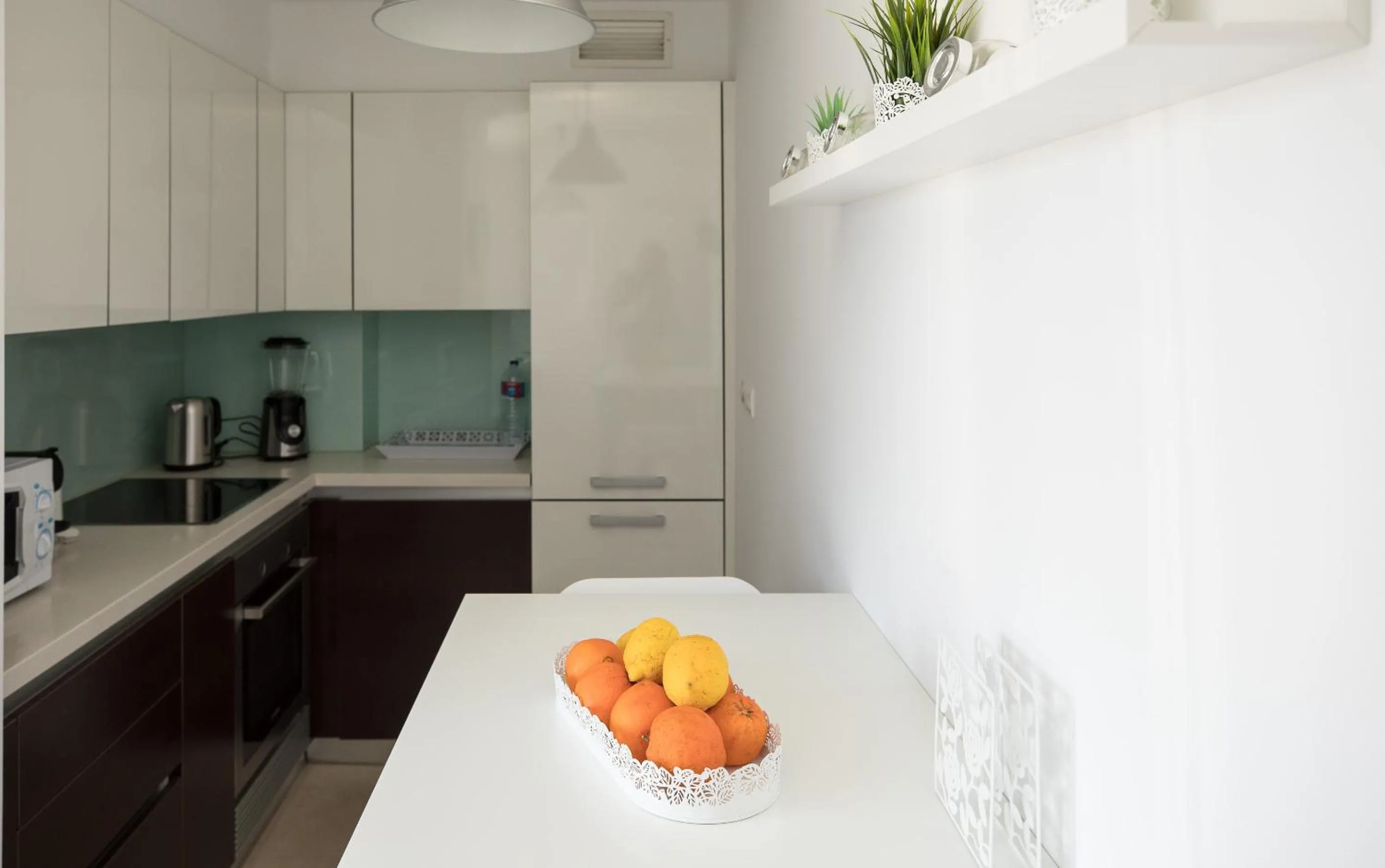 Kitchen or kitchenette in Charming Apartment with Balcony & Pool
