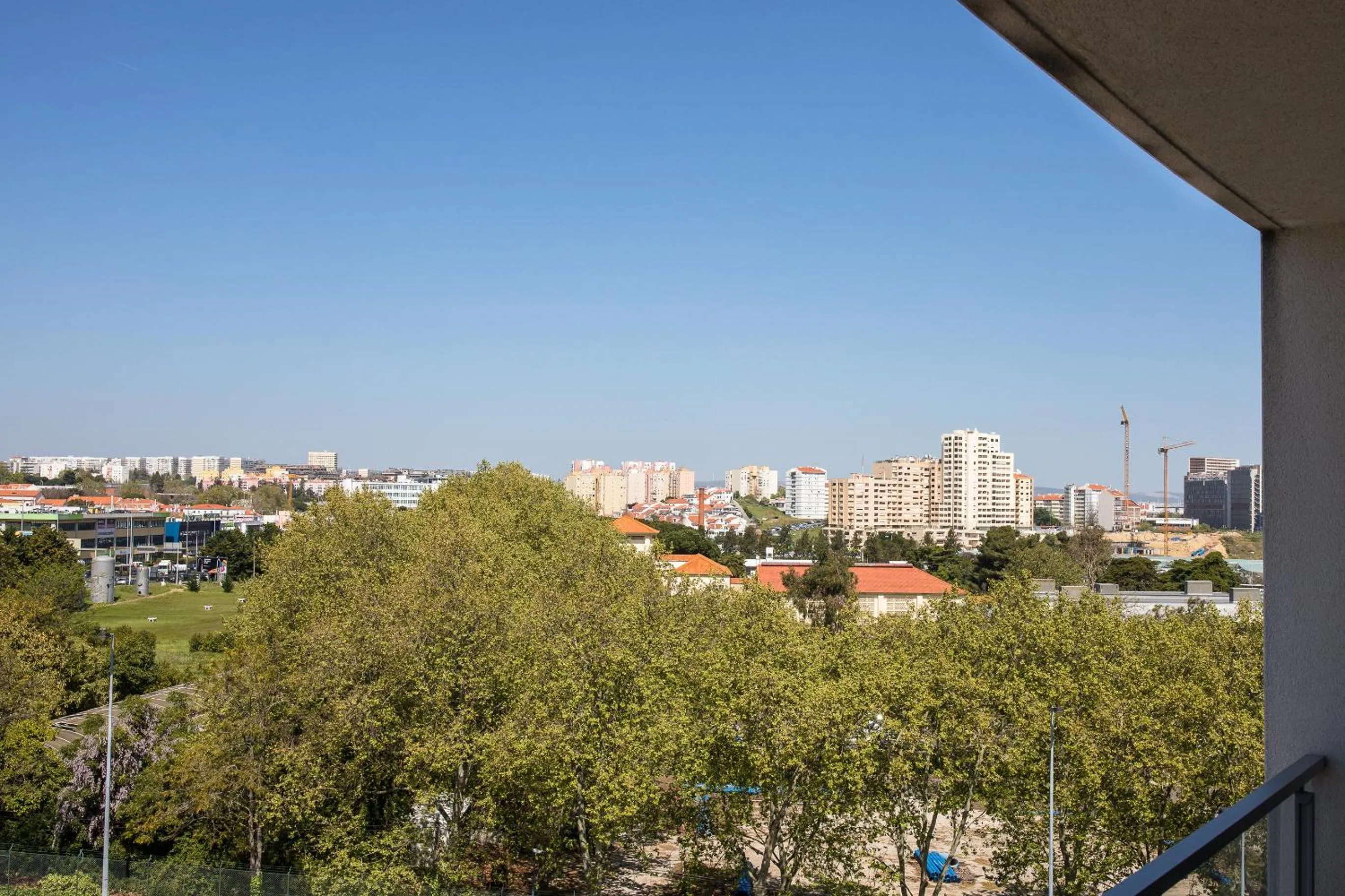 City view in Charming Apartment with Balcony & Pool
