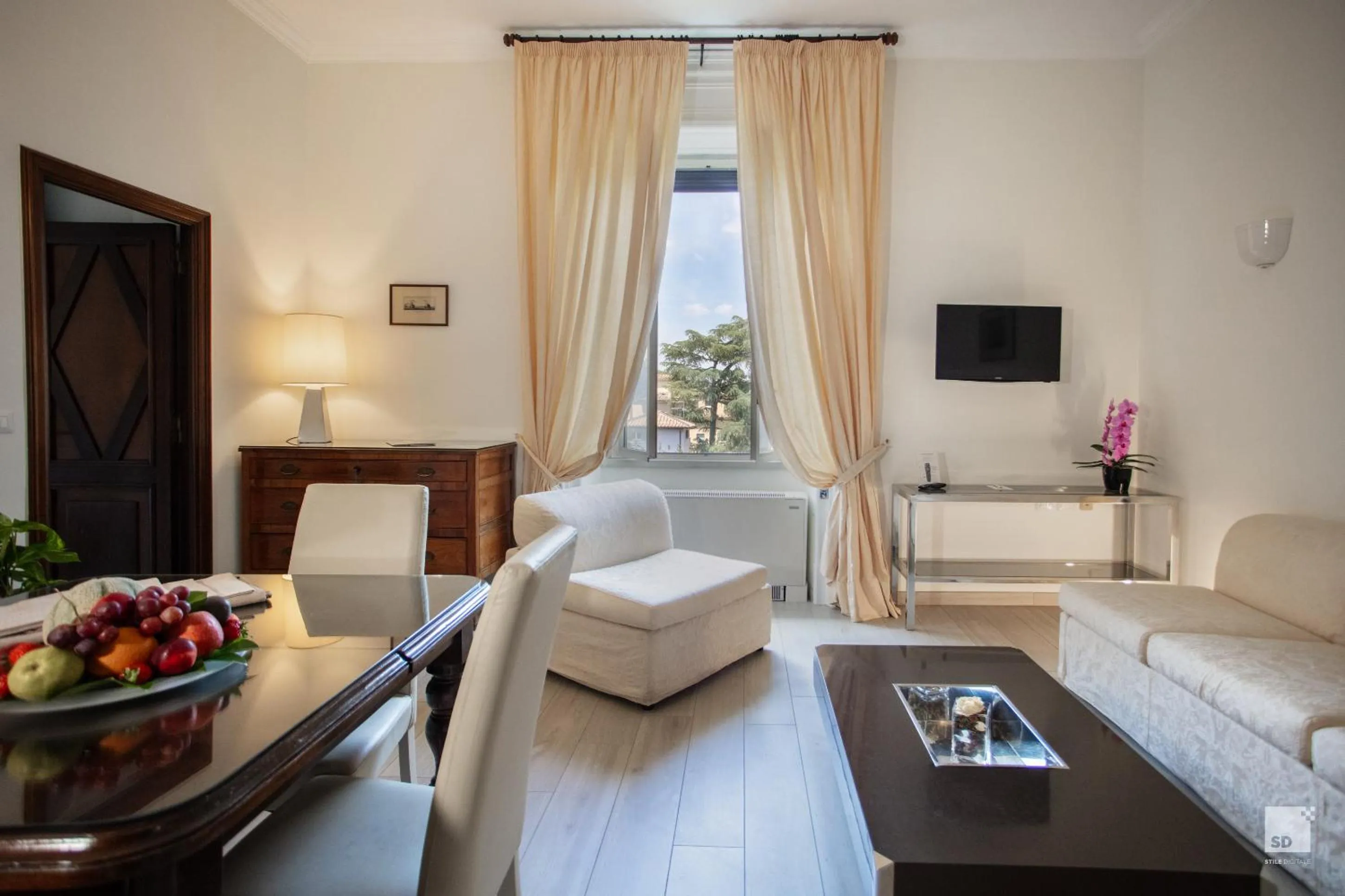 Seating area, Bed in Aldrovandi Residence City Suites