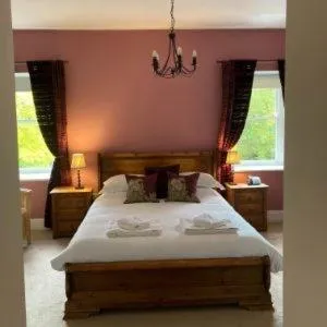 Bed in The Punch Bowl Inn