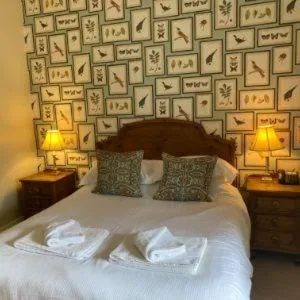 Bed in The Punch Bowl Inn