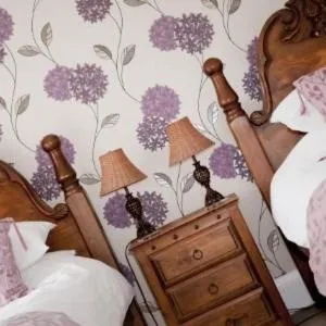 Bed in The Punch Bowl Inn