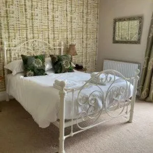 Bed in The Punch Bowl Inn