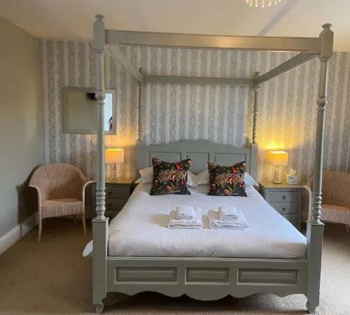 Bed in The Punch Bowl Inn