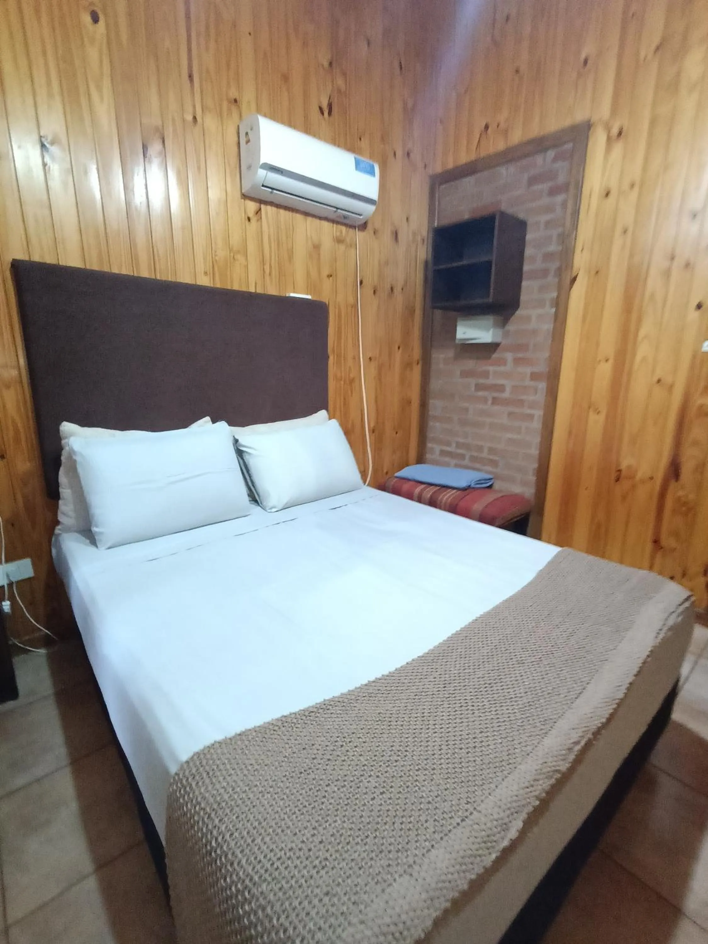 Bed in El Descanso Iguazú by DOT Cabana