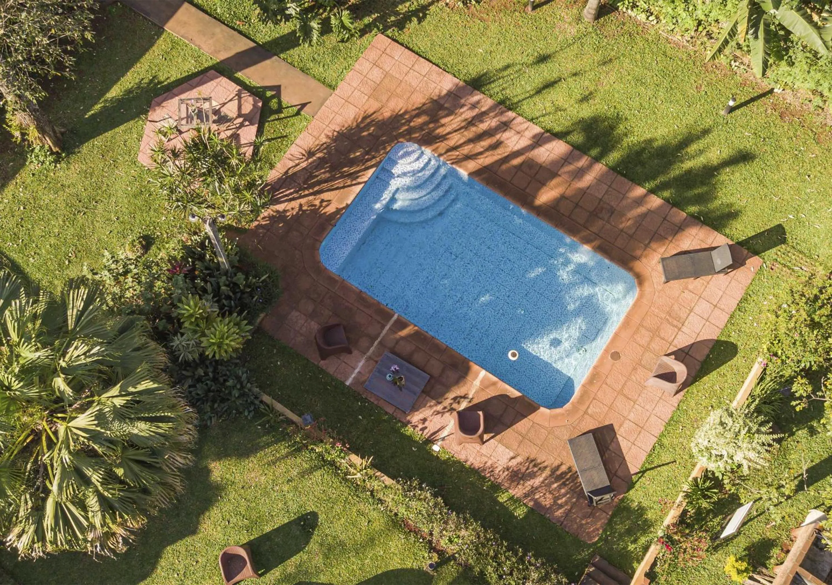 Garden in El Descanso Iguazú by DOT Cabana