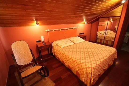 Photo of the whole room, Bed in Casa Suarna