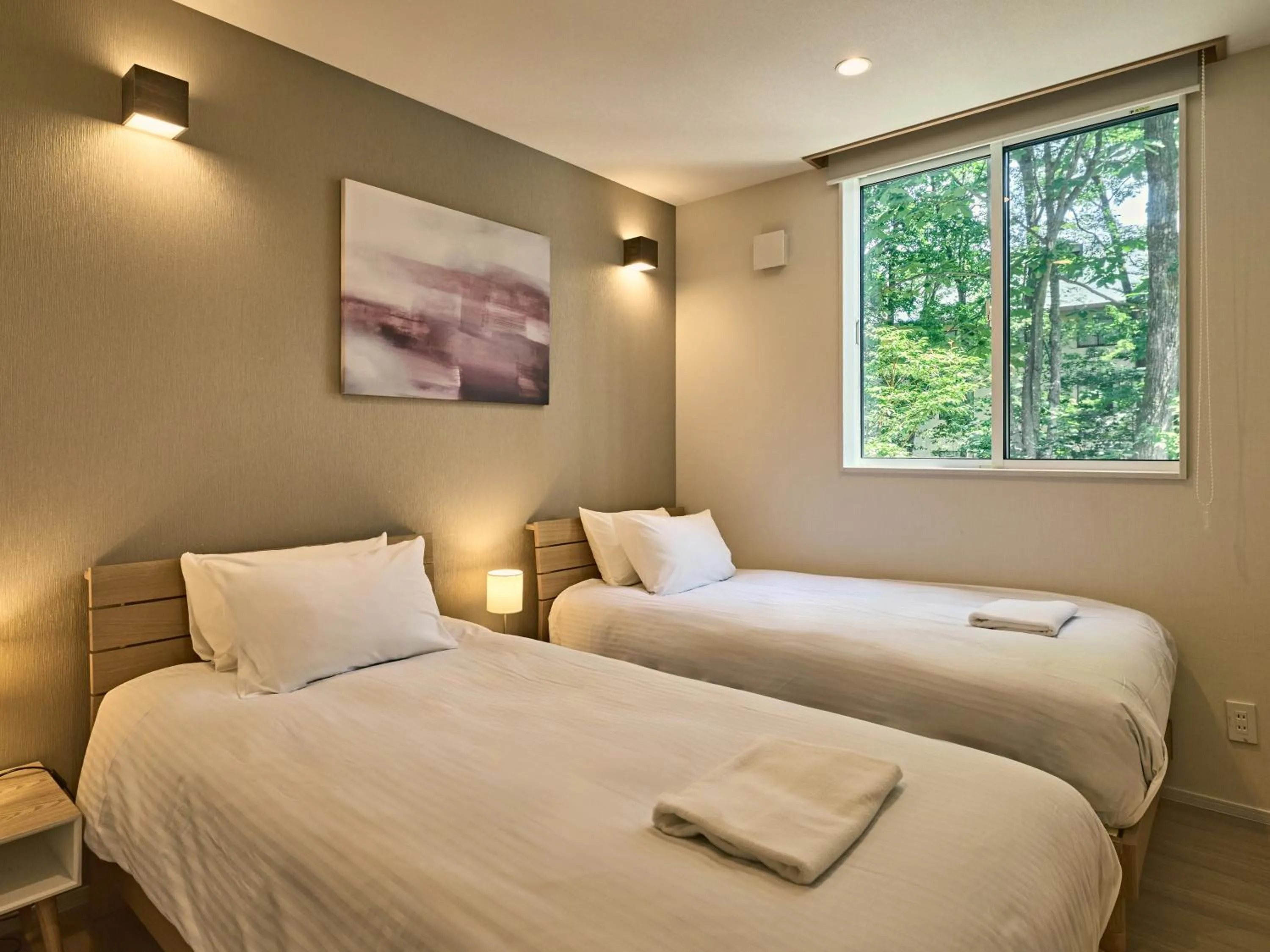 Bed in The Seasons Apartments Hakuba