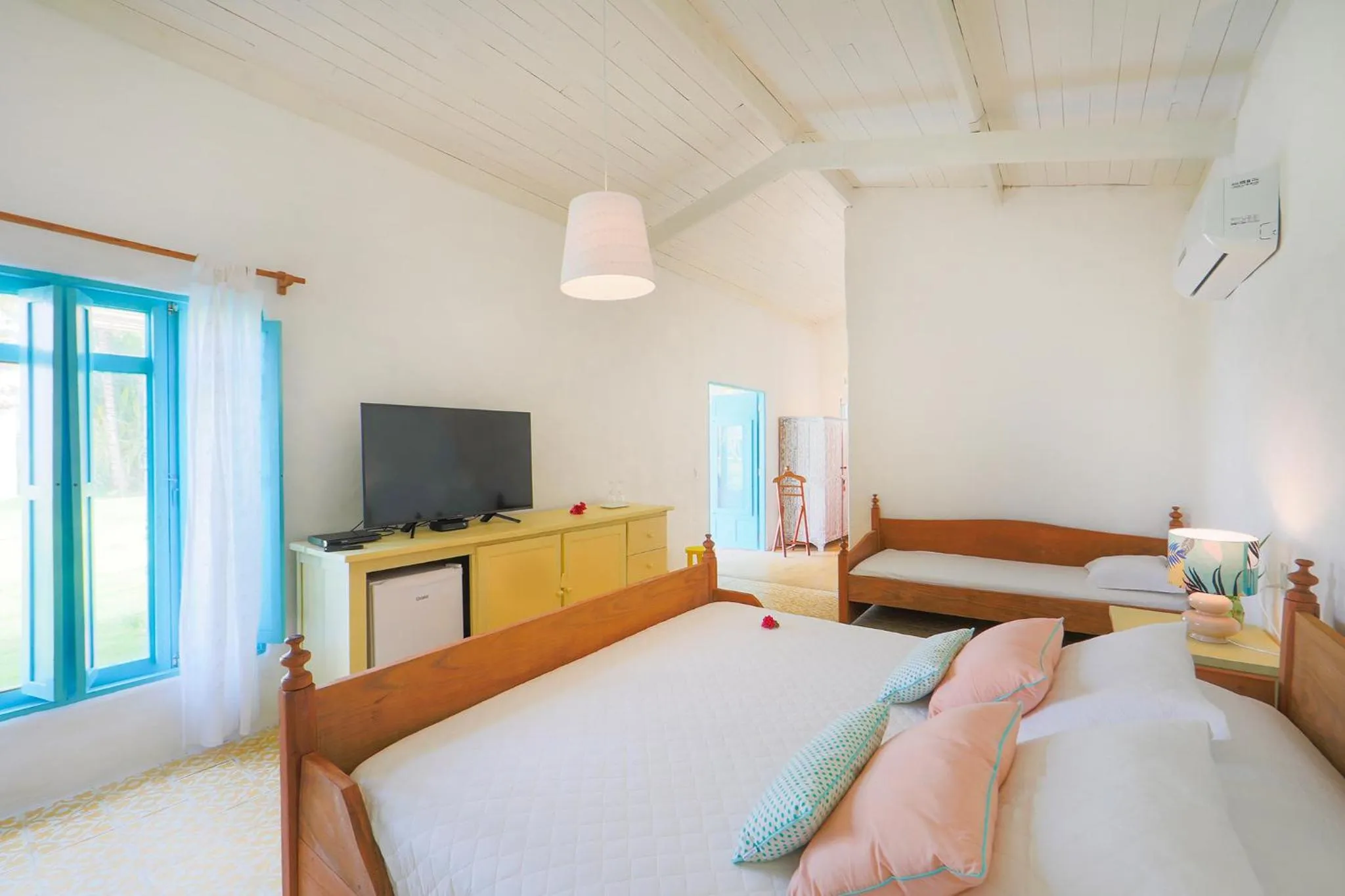 Bed in Pousada Patacho