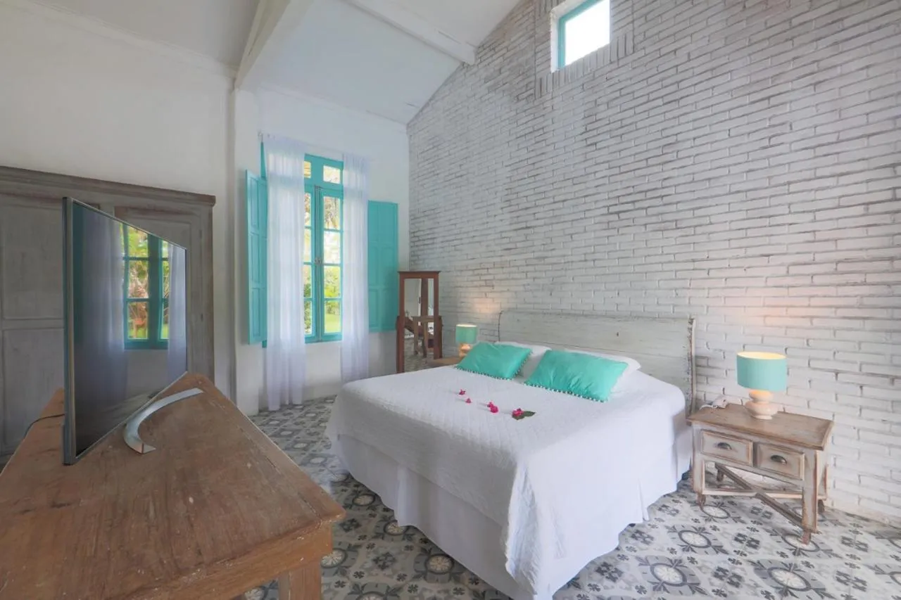 Bed in Pousada Patacho