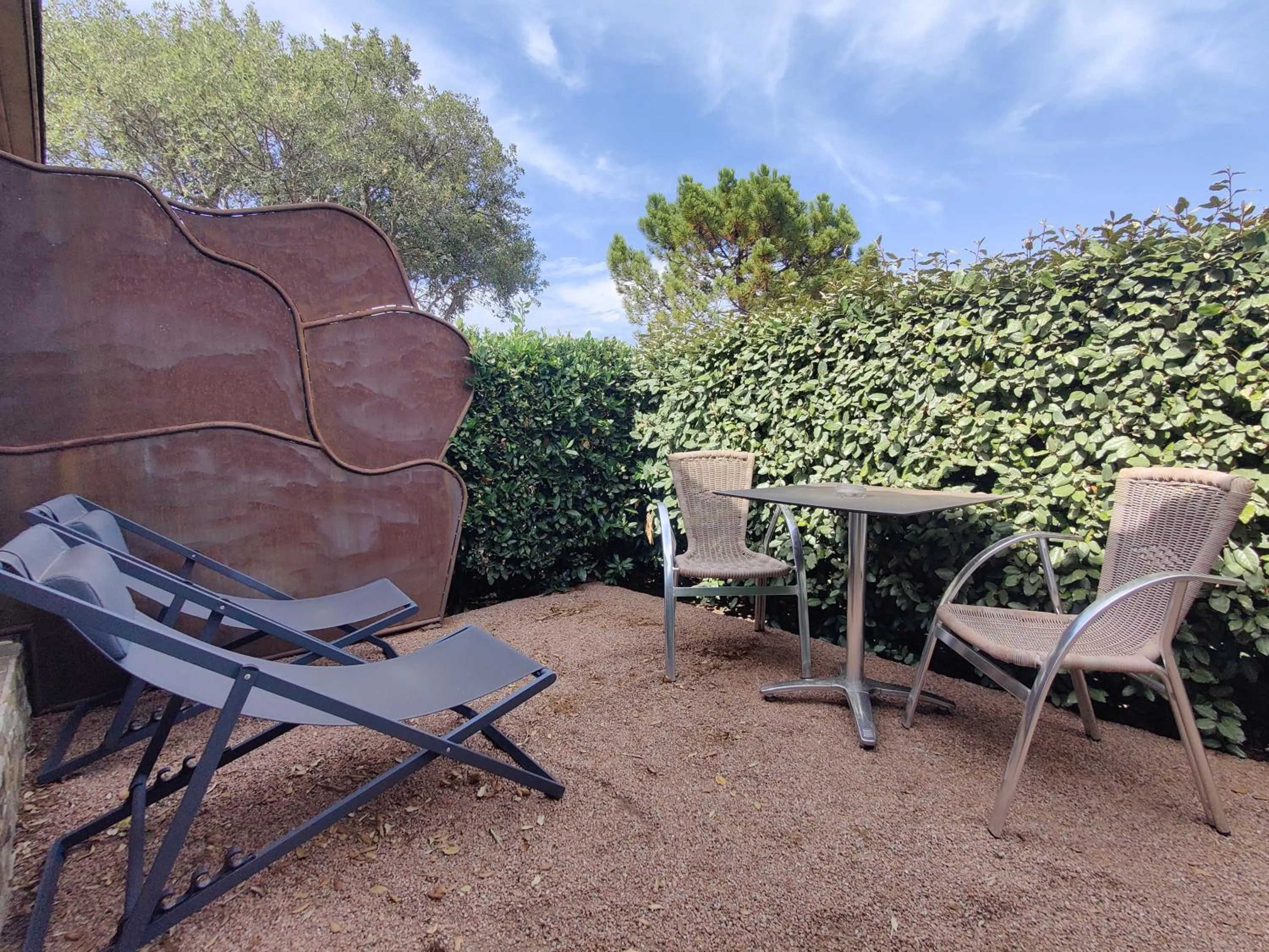 Patio in Le Roc E Fiori Hotel - Teritoria