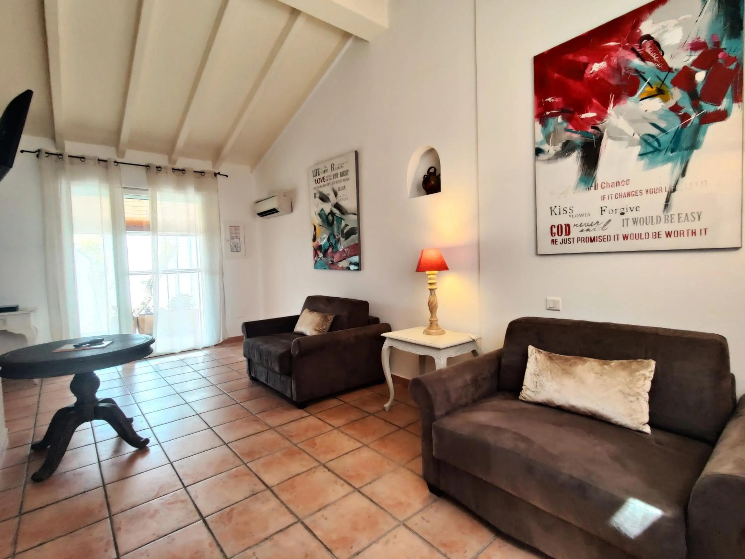 Living room in Le Roc E Fiori Hotel - Teritoria