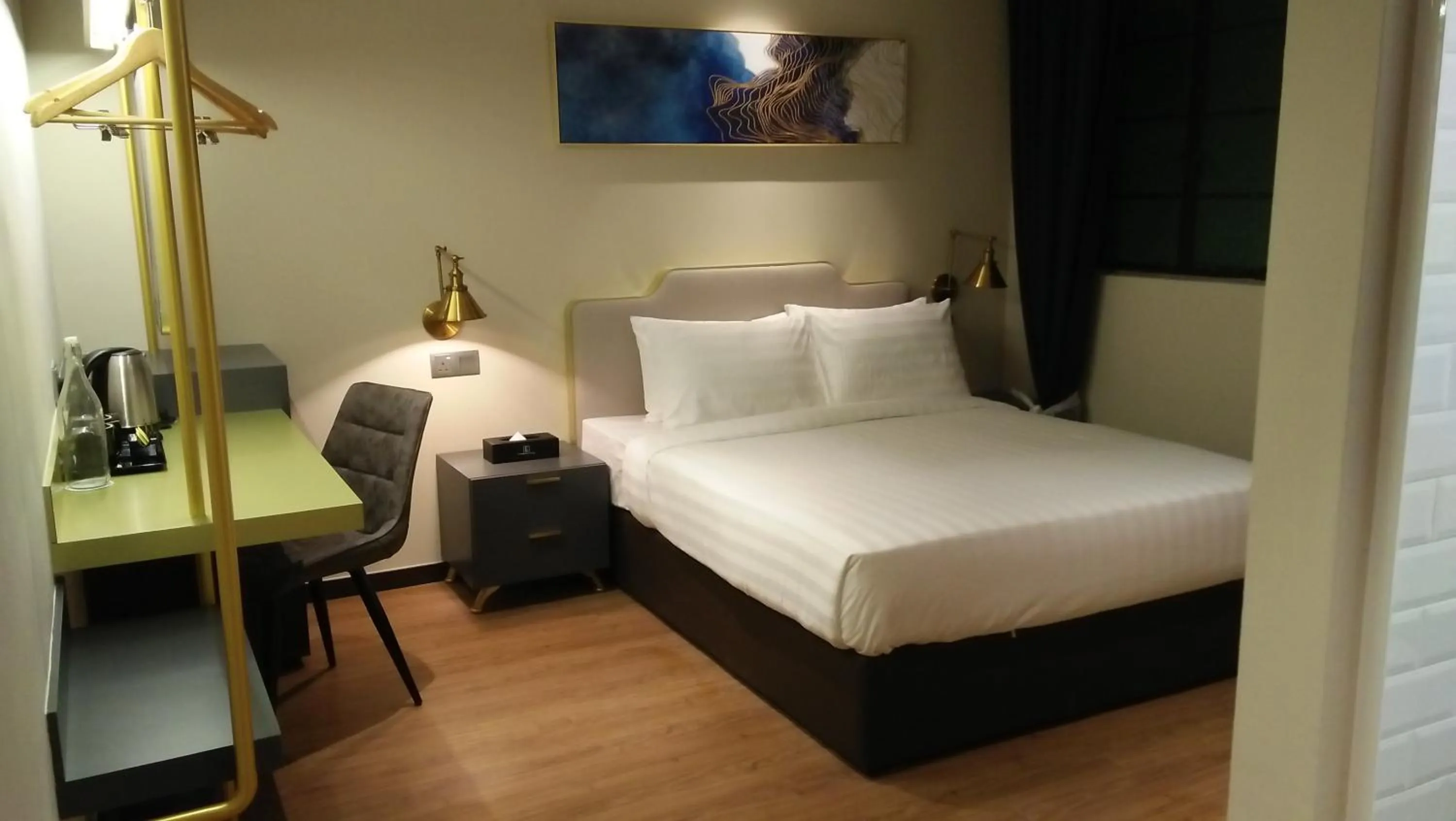 Bed in Le Embassy Hotel Georgetown