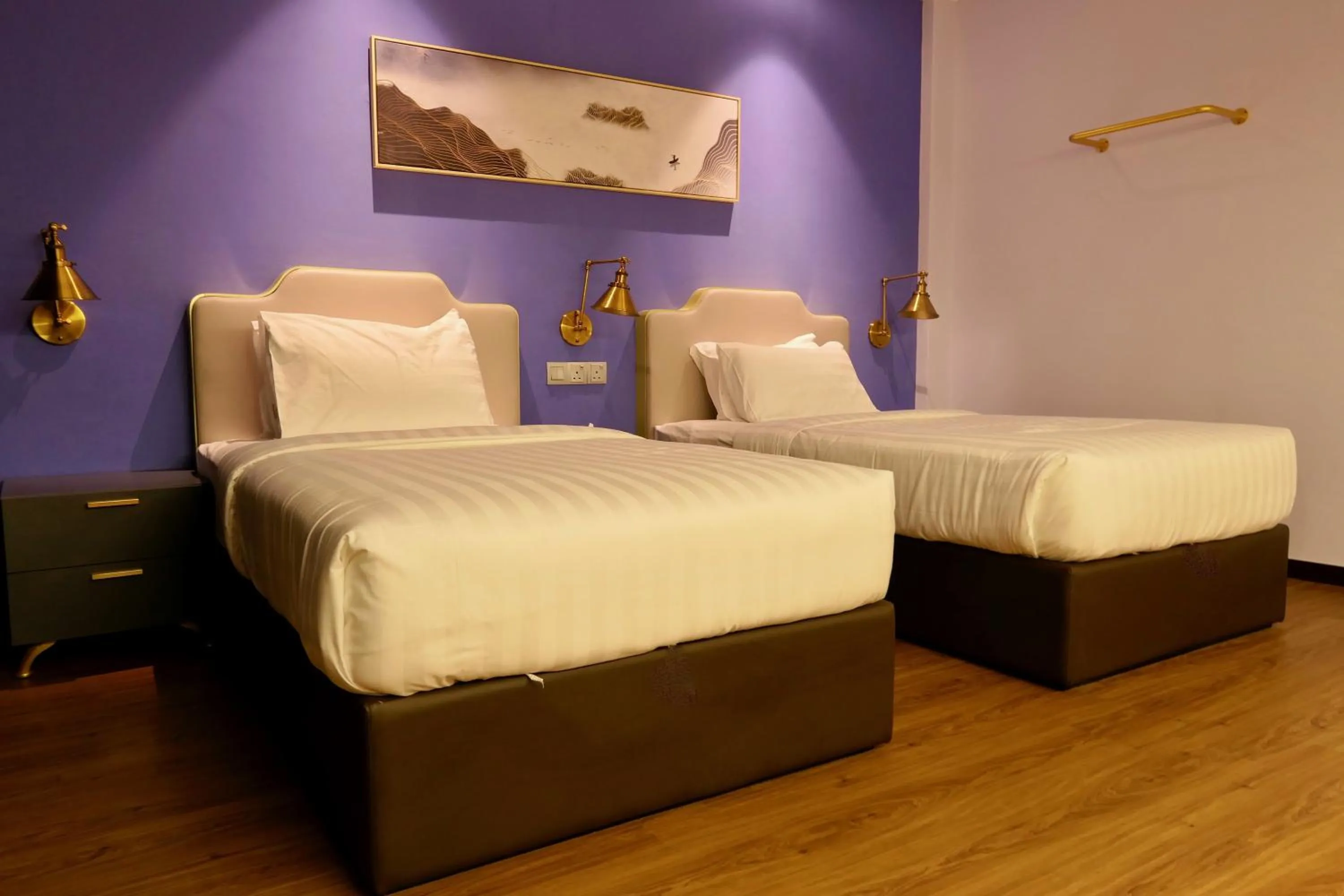 Bed in Le Embassy Hotel Georgetown