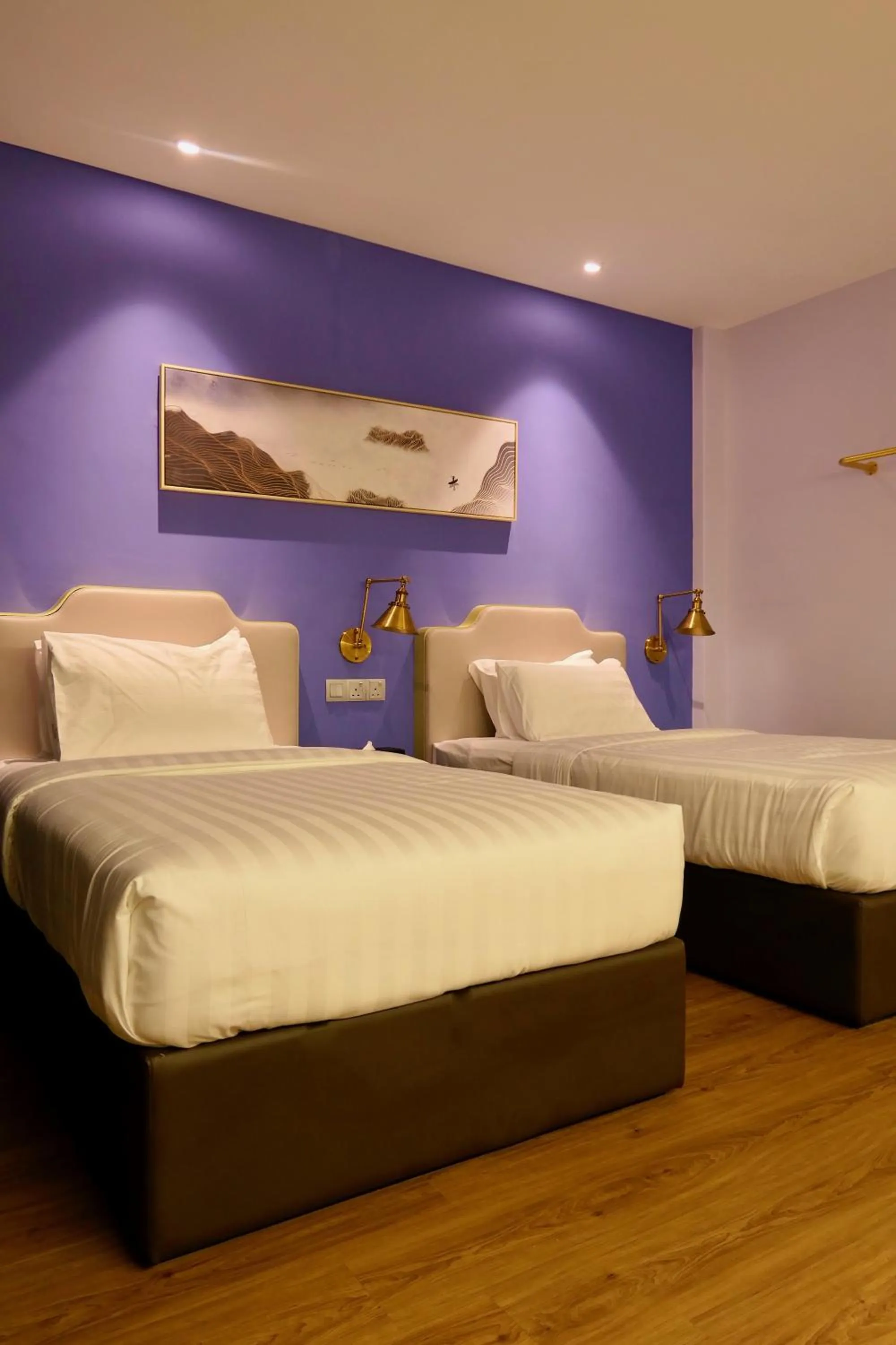 Bed in Le Embassy Hotel Georgetown