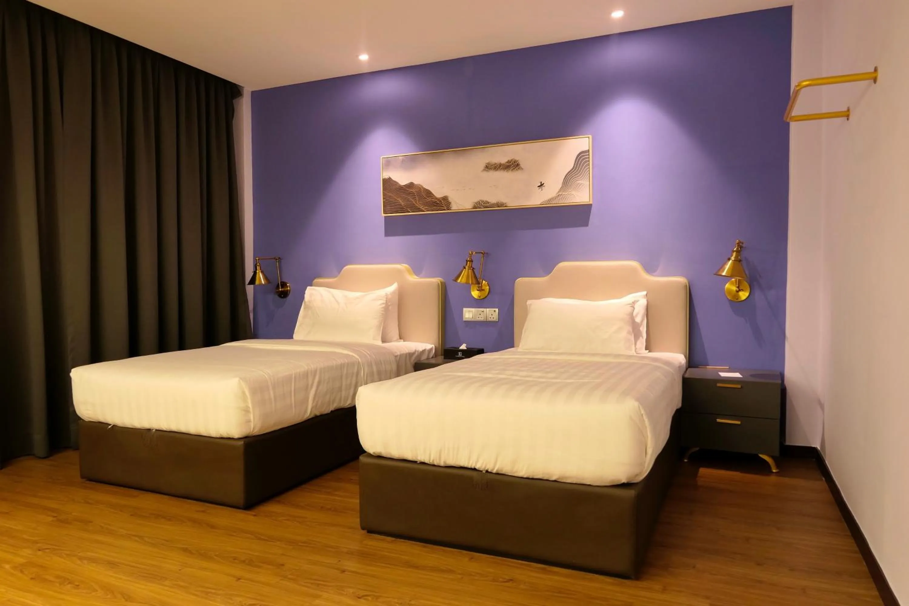 Bed in Le Embassy Hotel Georgetown