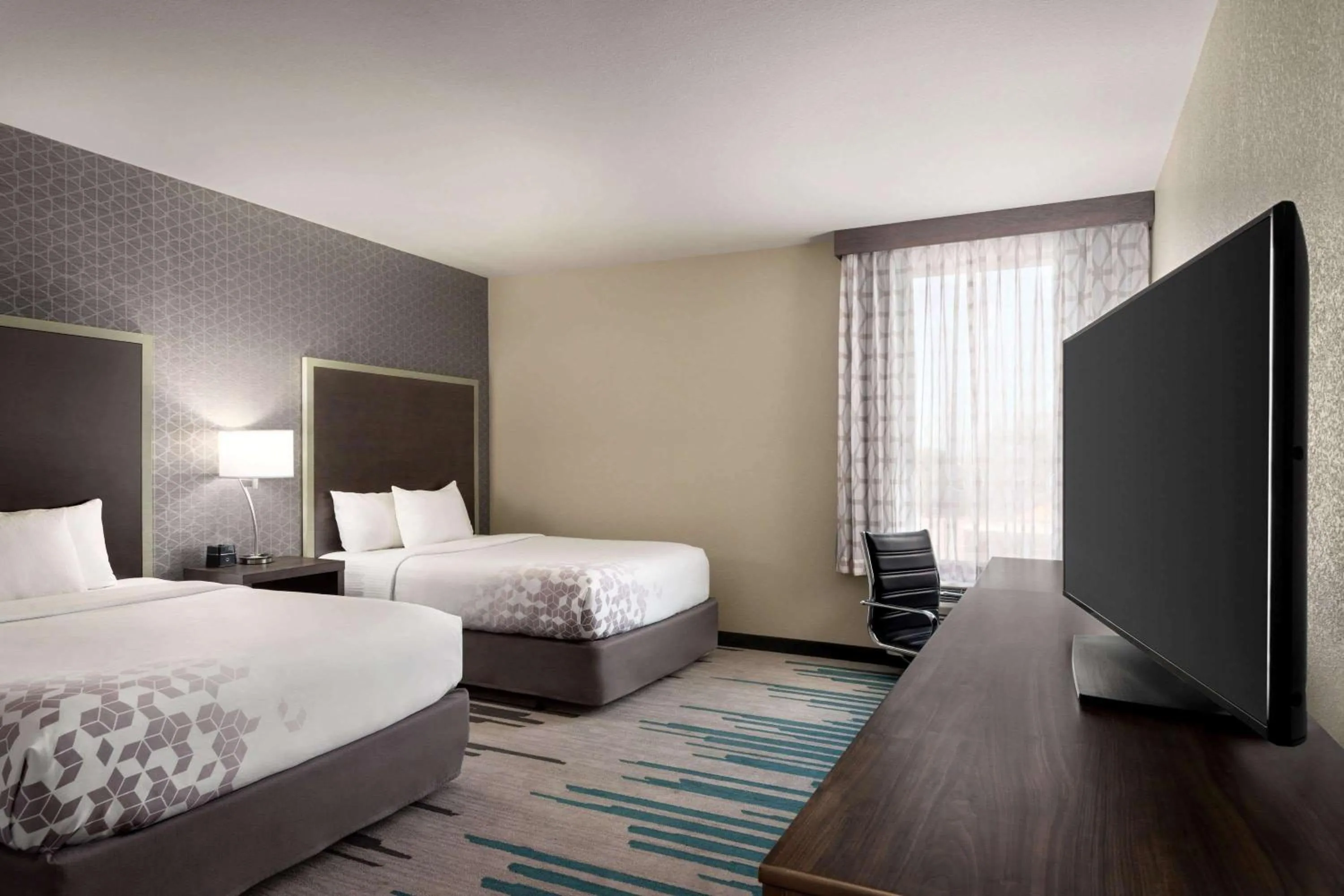 Photo of the whole room, Bed in La Quinta by Wyndham Clovis CA