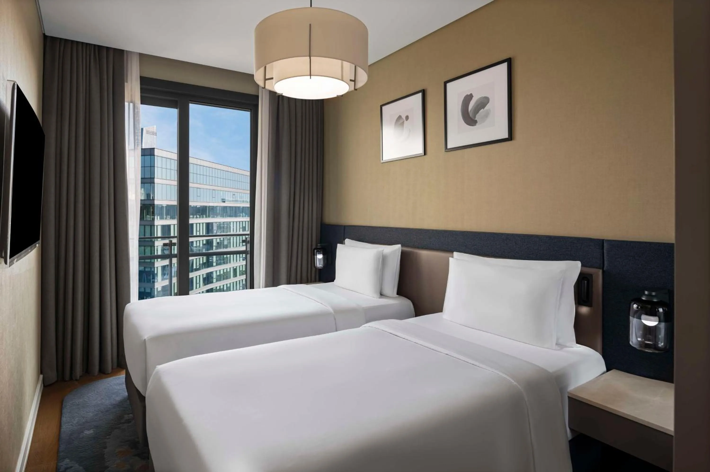 Bed in Radisson Residences Vadistanbul