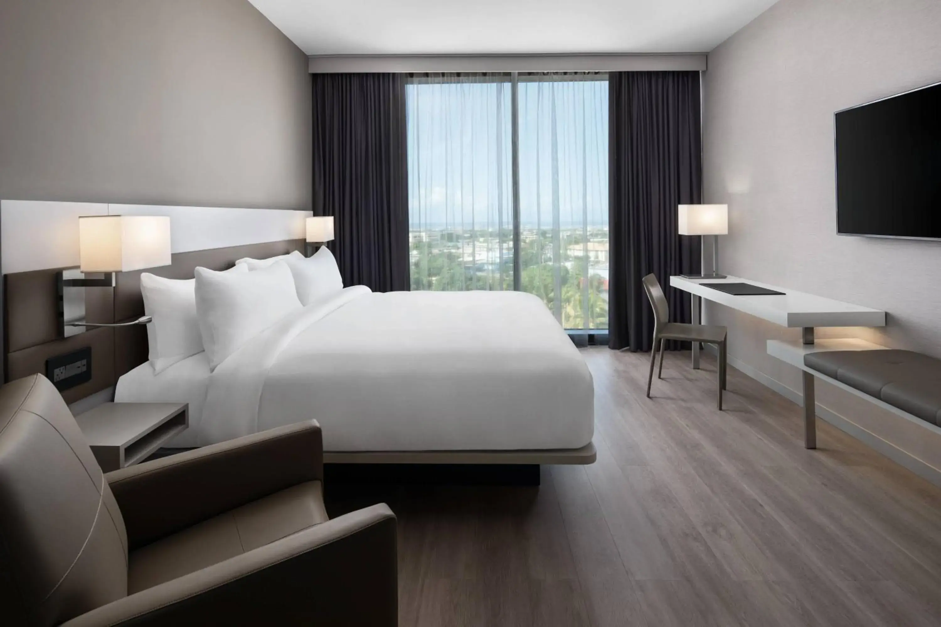 Guest room, 1 King, Sofa bed in AC Hotel by Marriott Kingston, Jamaica Guest room, 1 King, Sofa bed in AC Hotel by Marriott Kingston, Jamaica