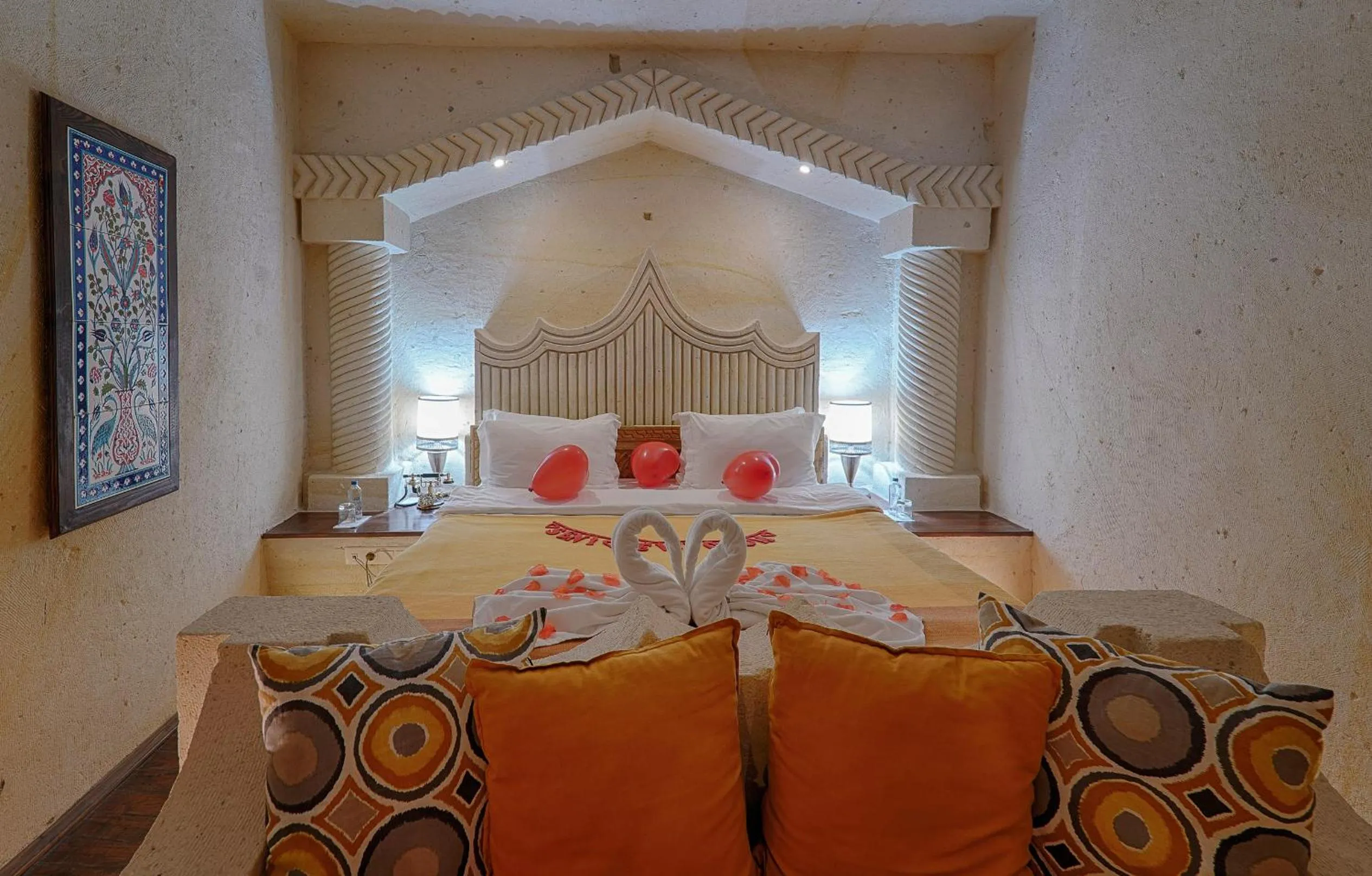 Bed in Taru Cave Suites