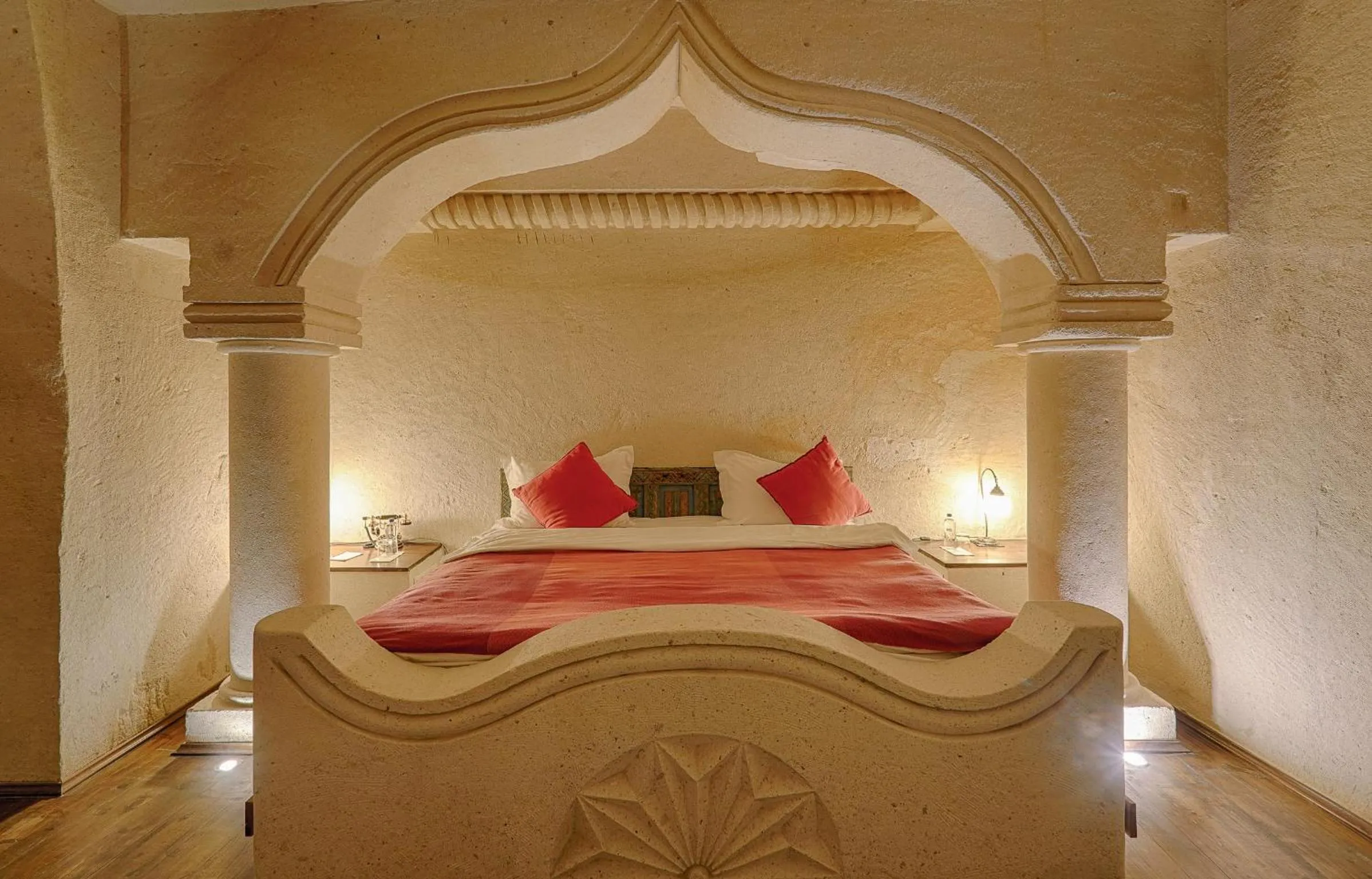 Bed in Taru Cave Suites