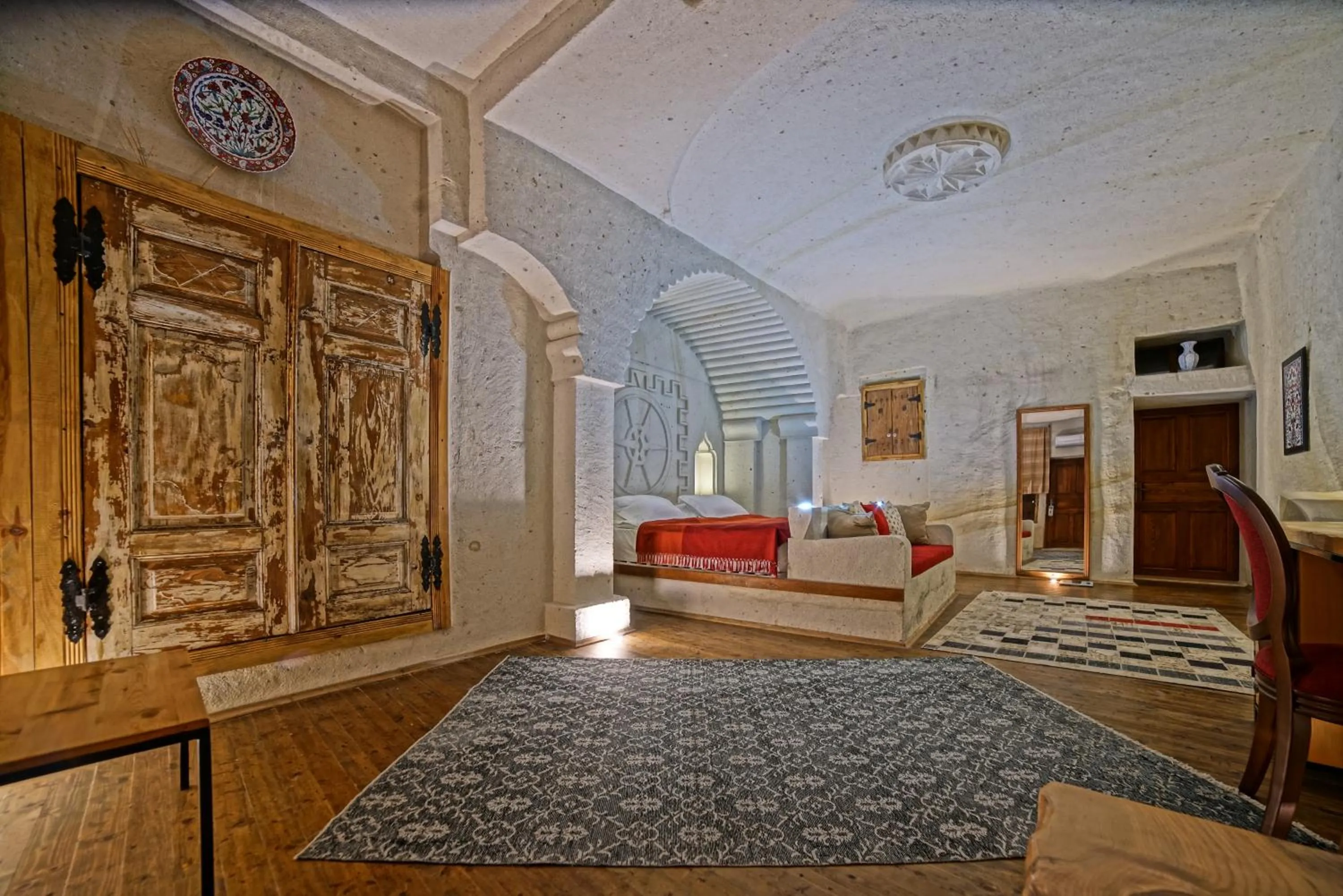 Bed in Taru Cave Suites