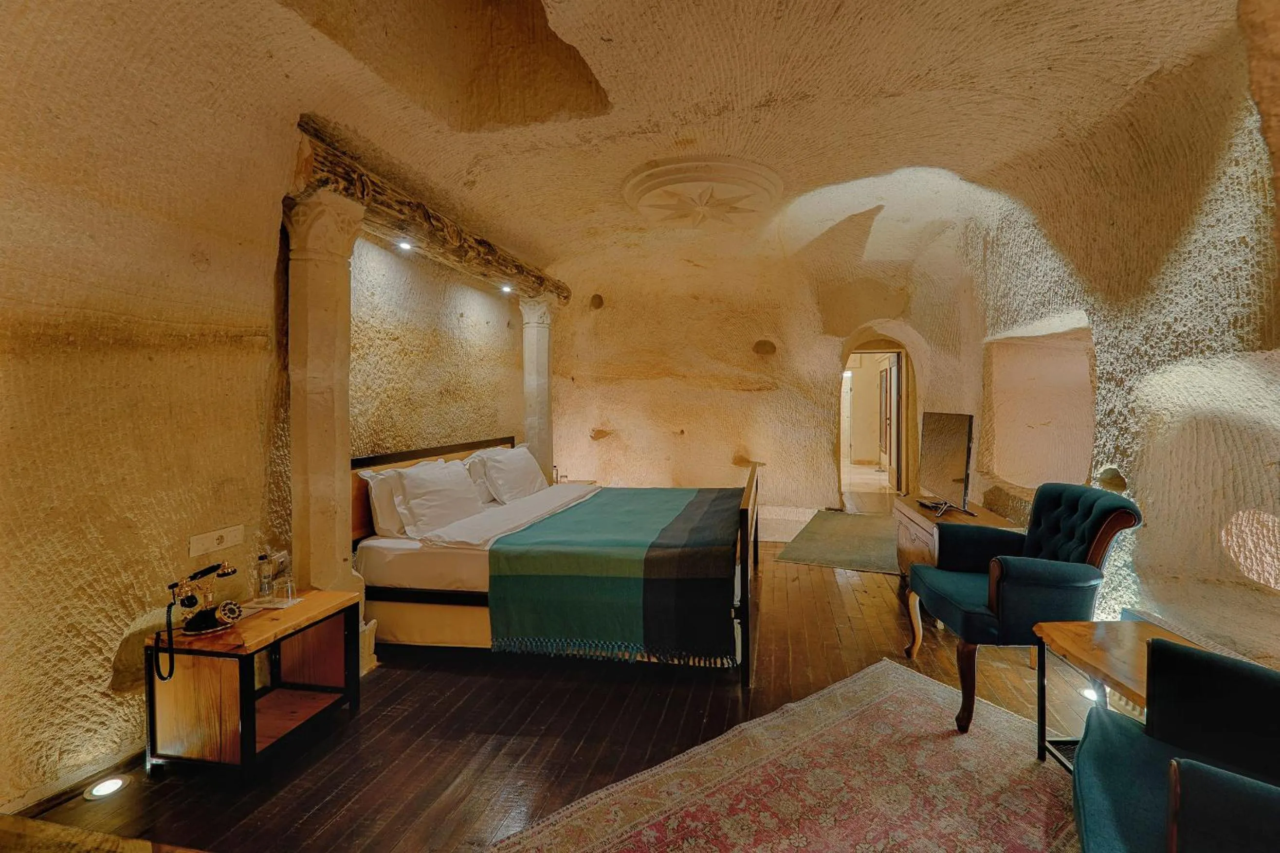 Bed in Taru Cave Suites