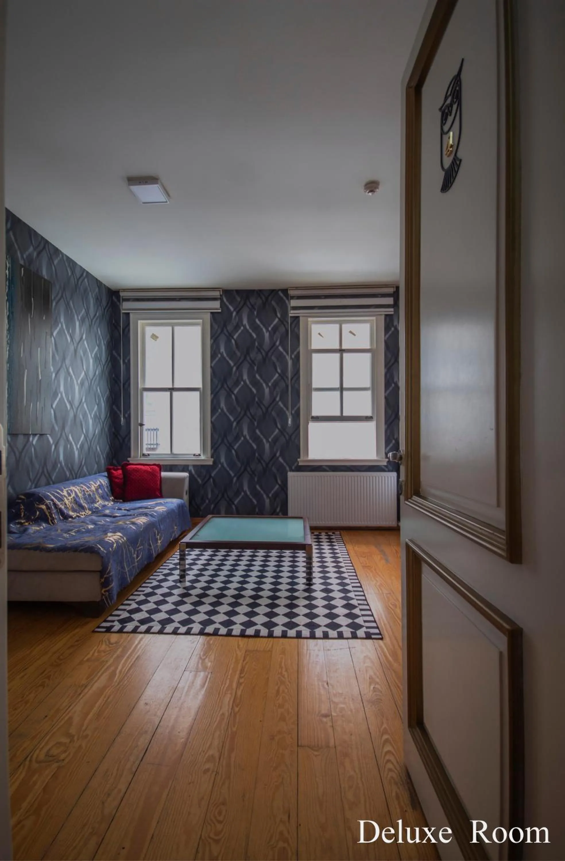 Seating area, Bed in PUHU OTEL