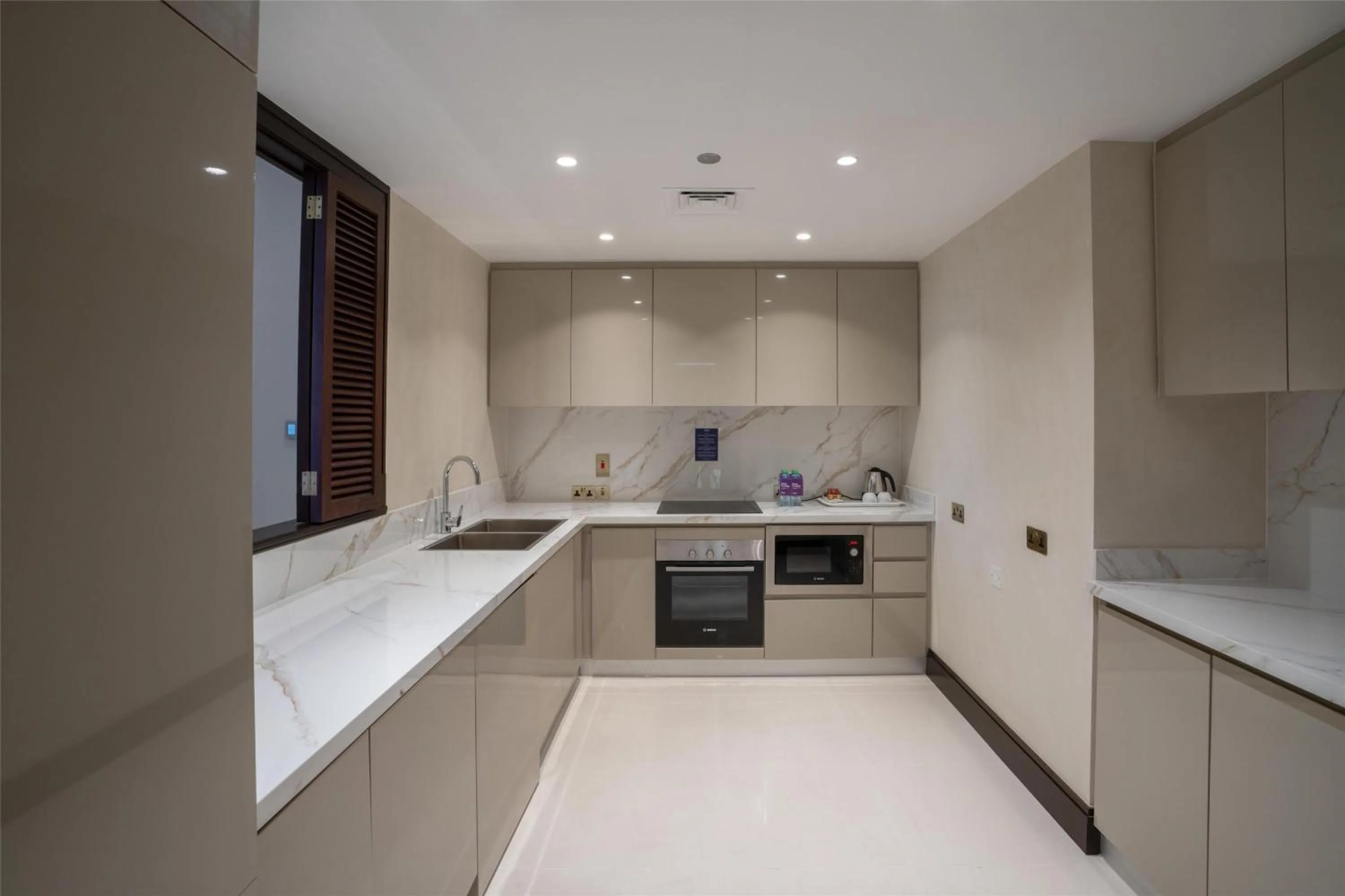 Kitchen or kitchenette in The Diplomat Radisson Blu Hotel Residence & Spa