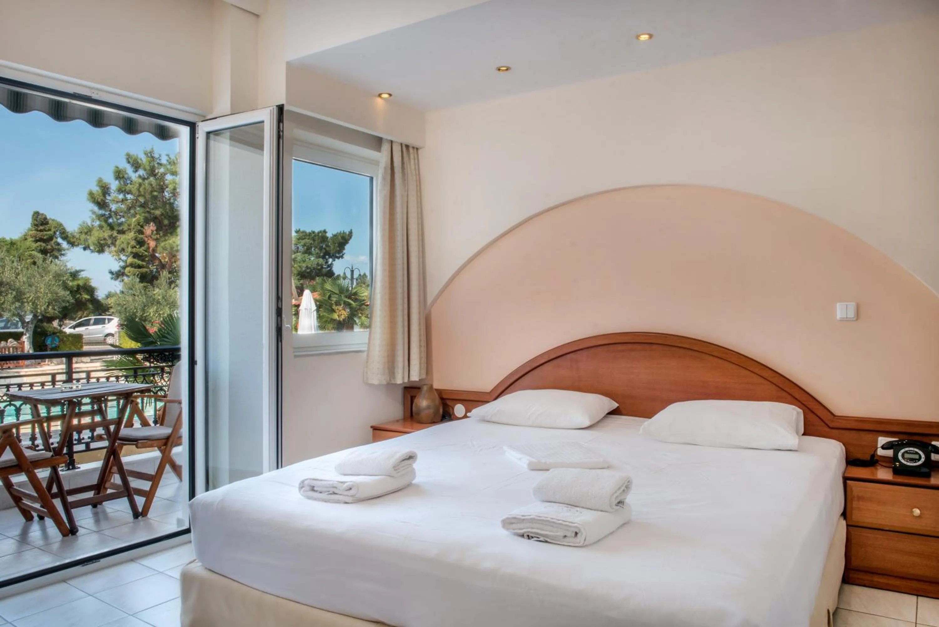 Bed in Pyrgos Hotel