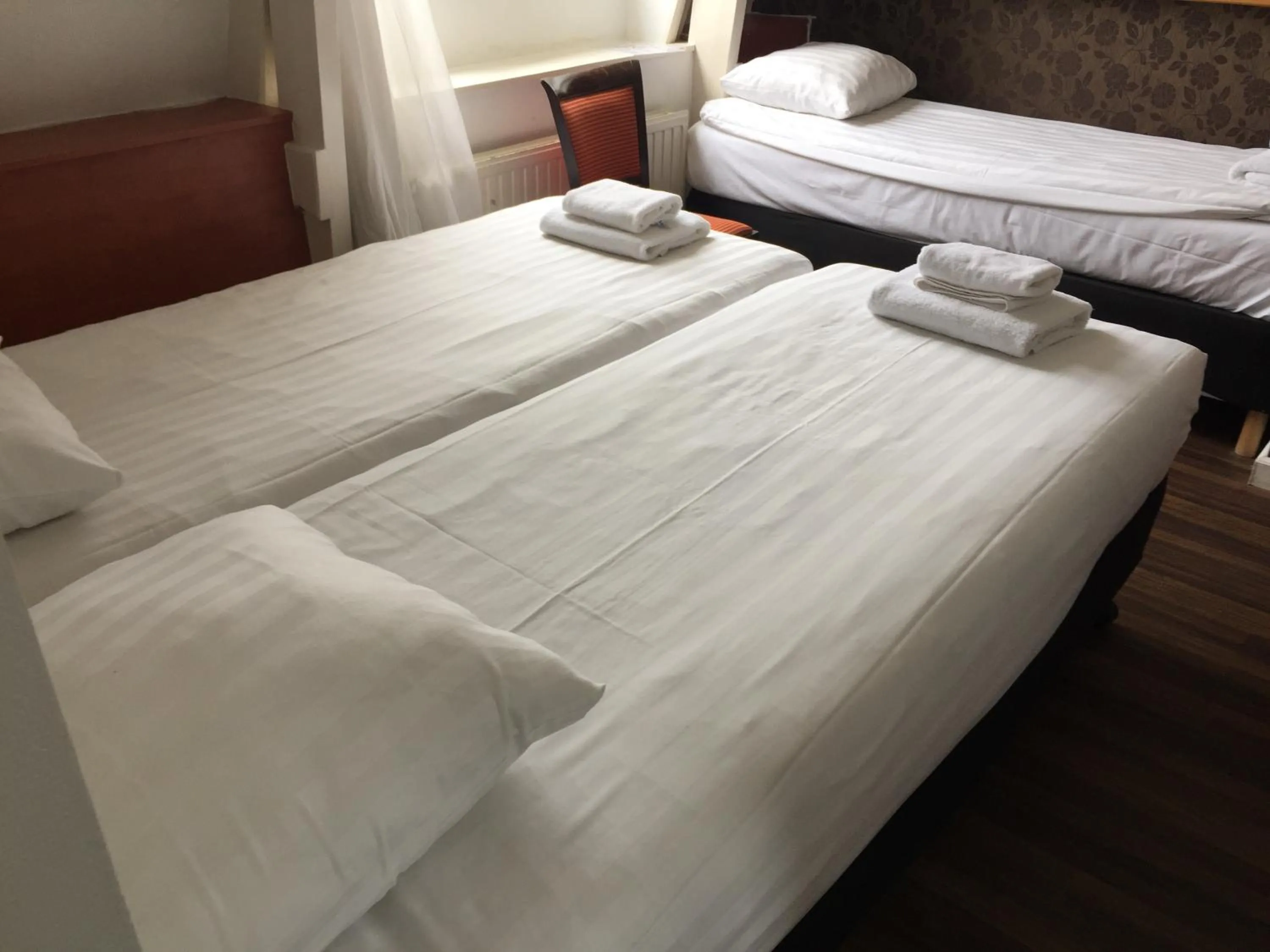 Bed in Hotel Amsterdam Inn