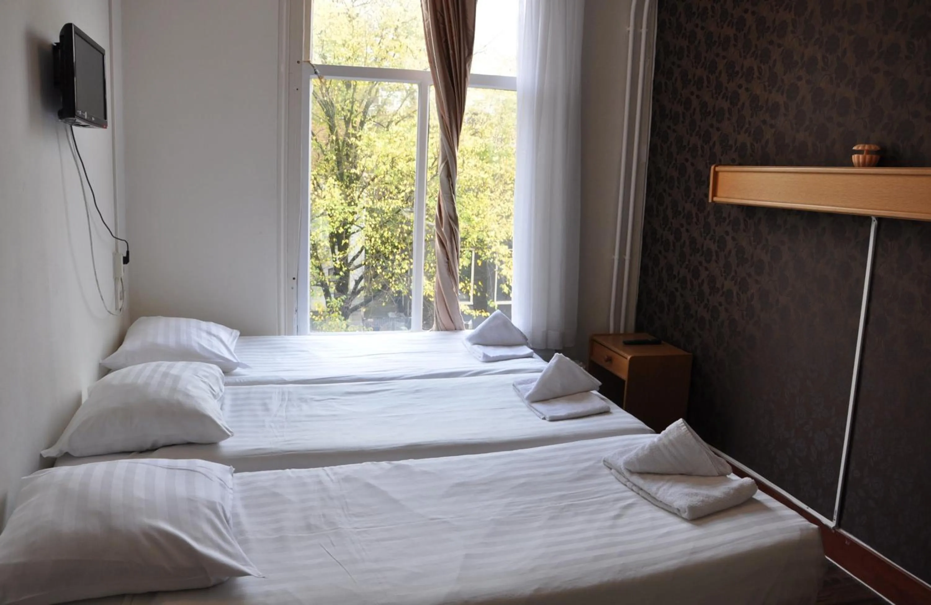 Bed in Hotel Amsterdam Inn