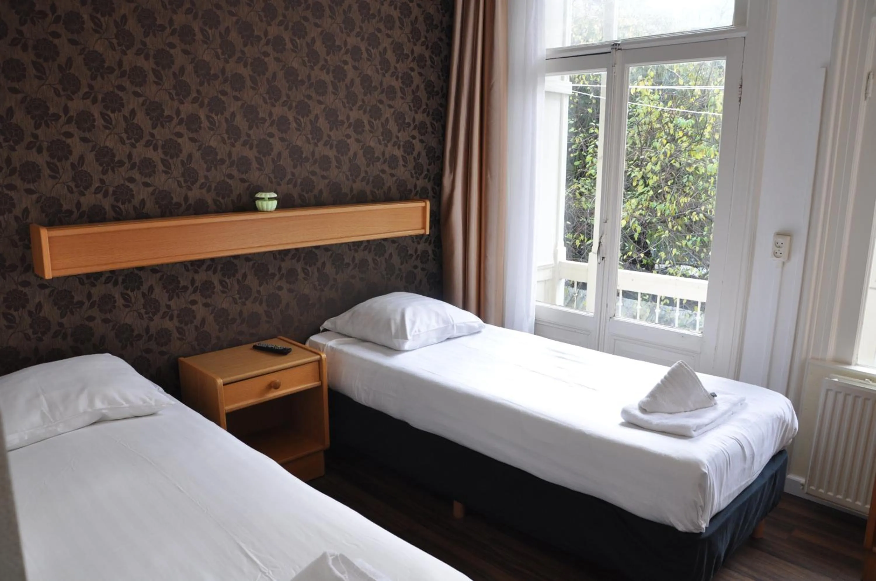 Bed in Hotel Amsterdam Inn