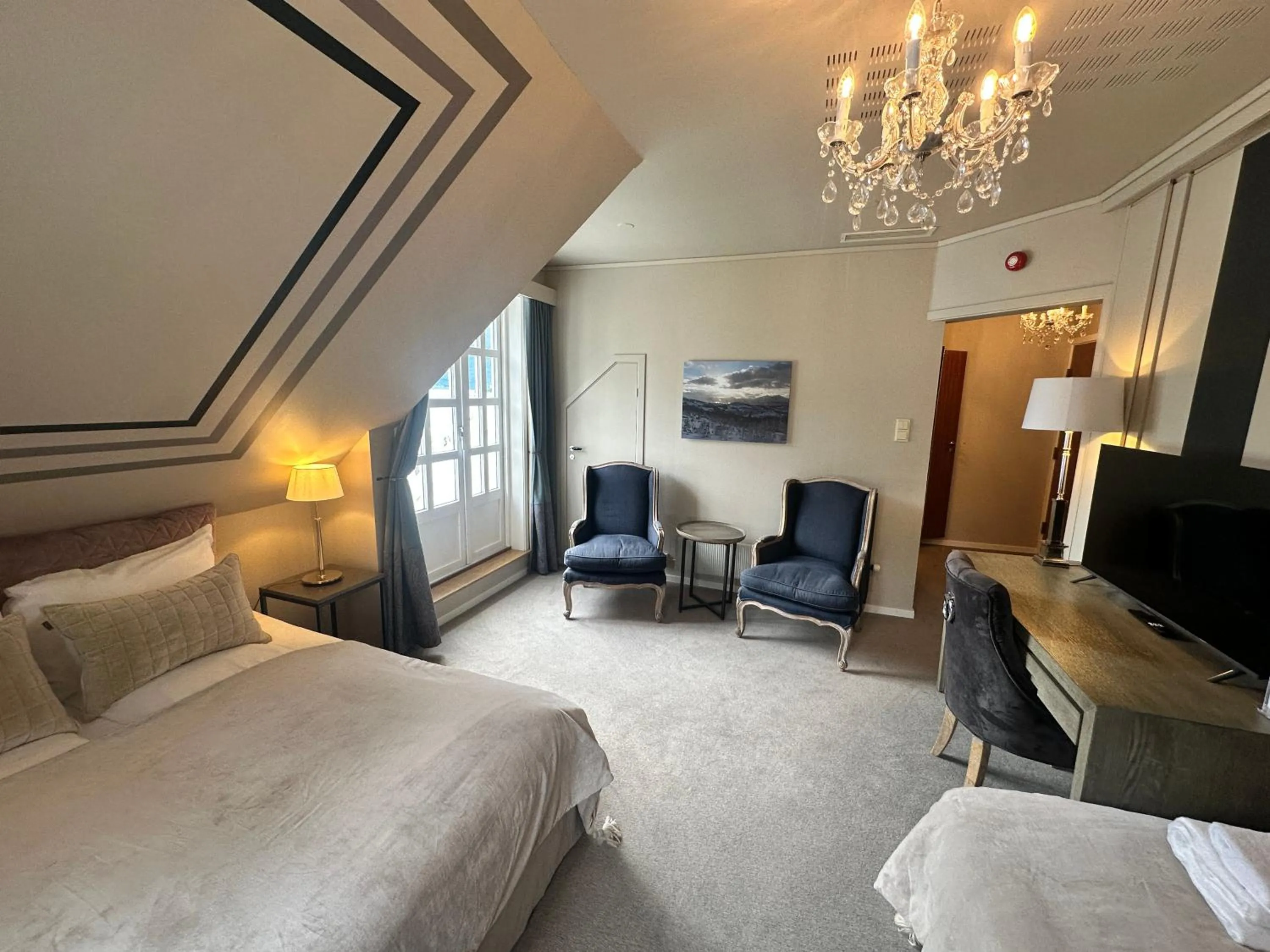 Seating area, Bed in Hofslund Fjord Hotel