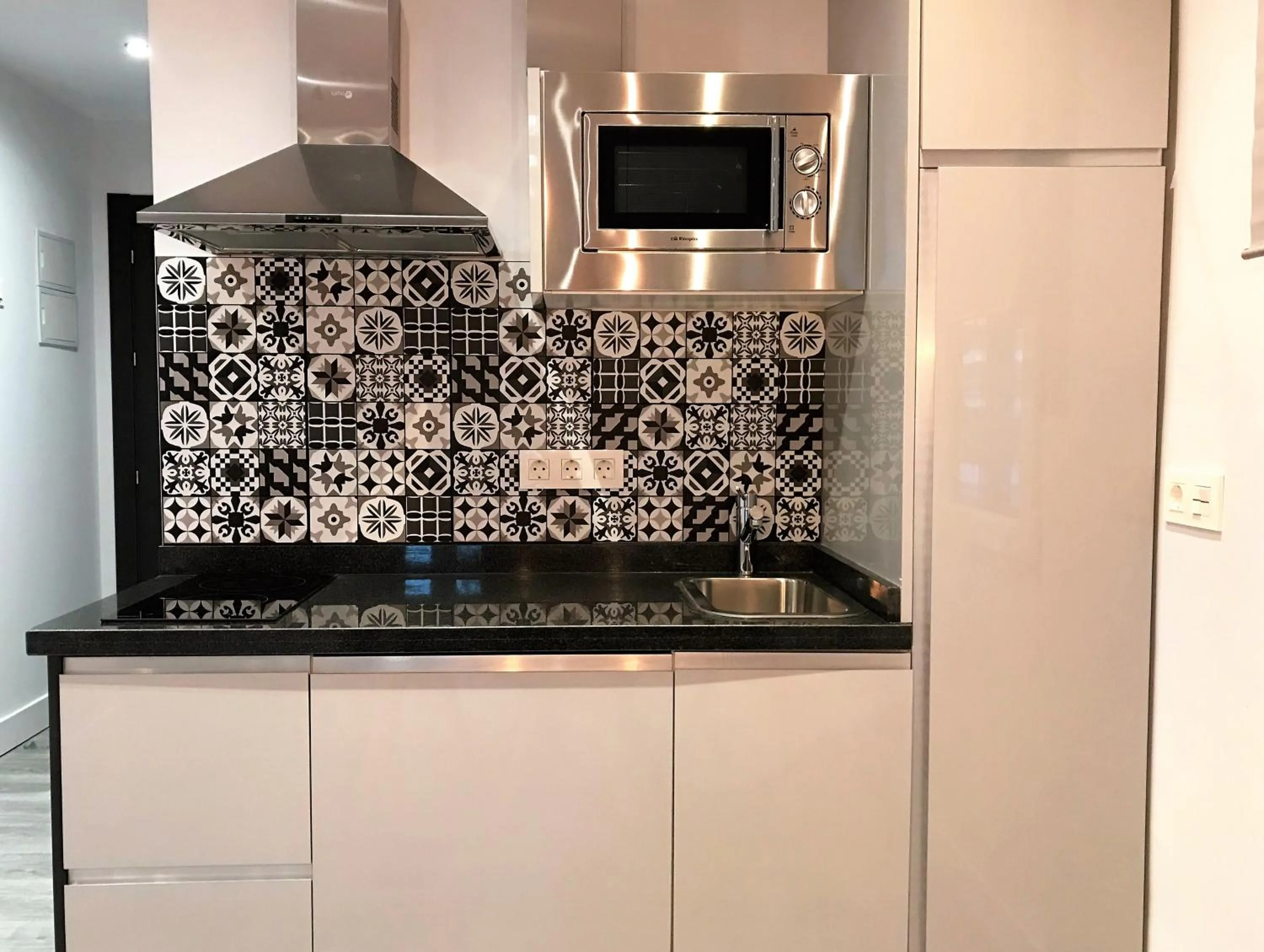 Kitchen or kitchenette in Apartamentos Ciudad de Ronda