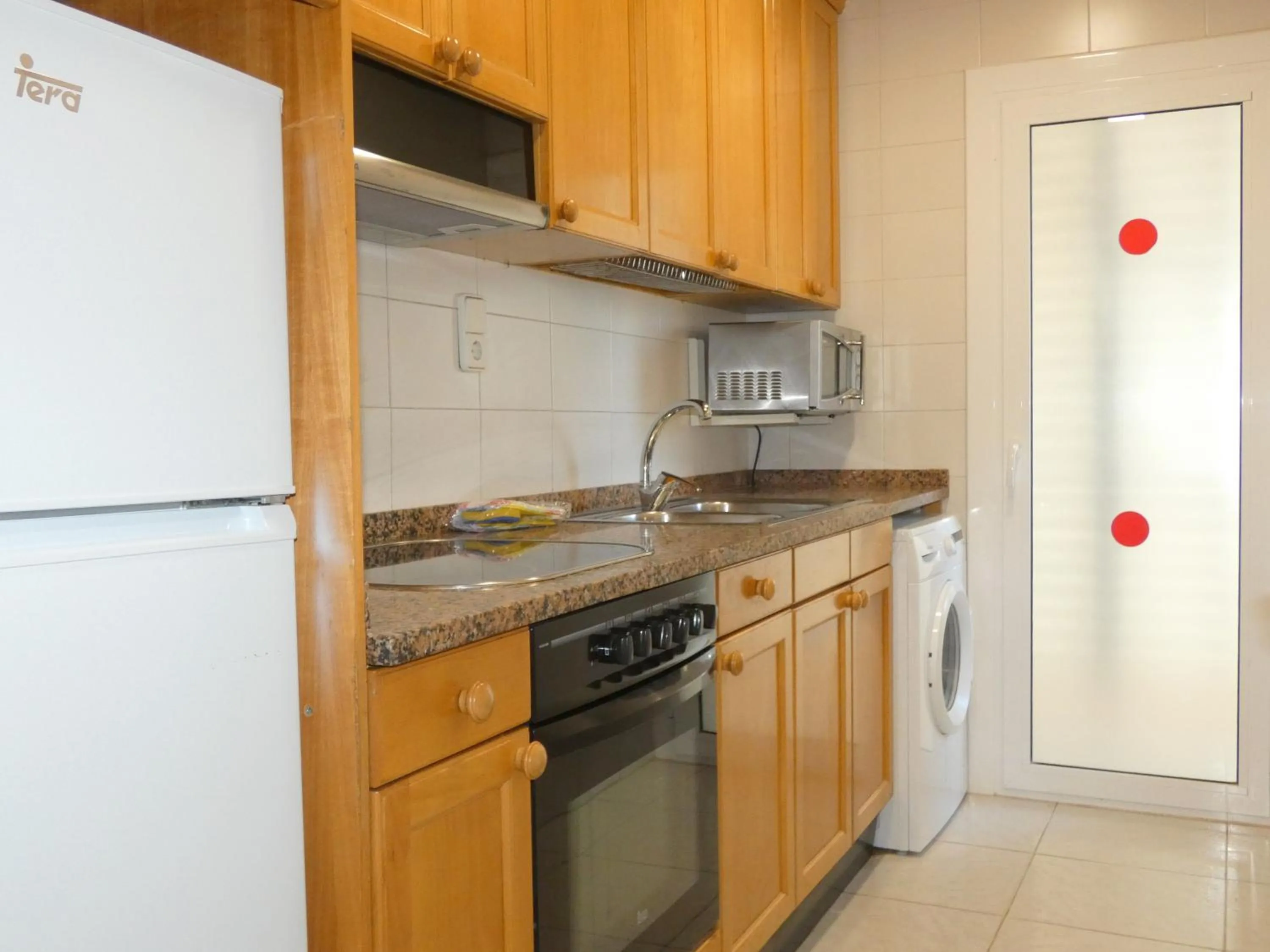 Kitchen or kitchenette in Rentalmar Family Acantilados