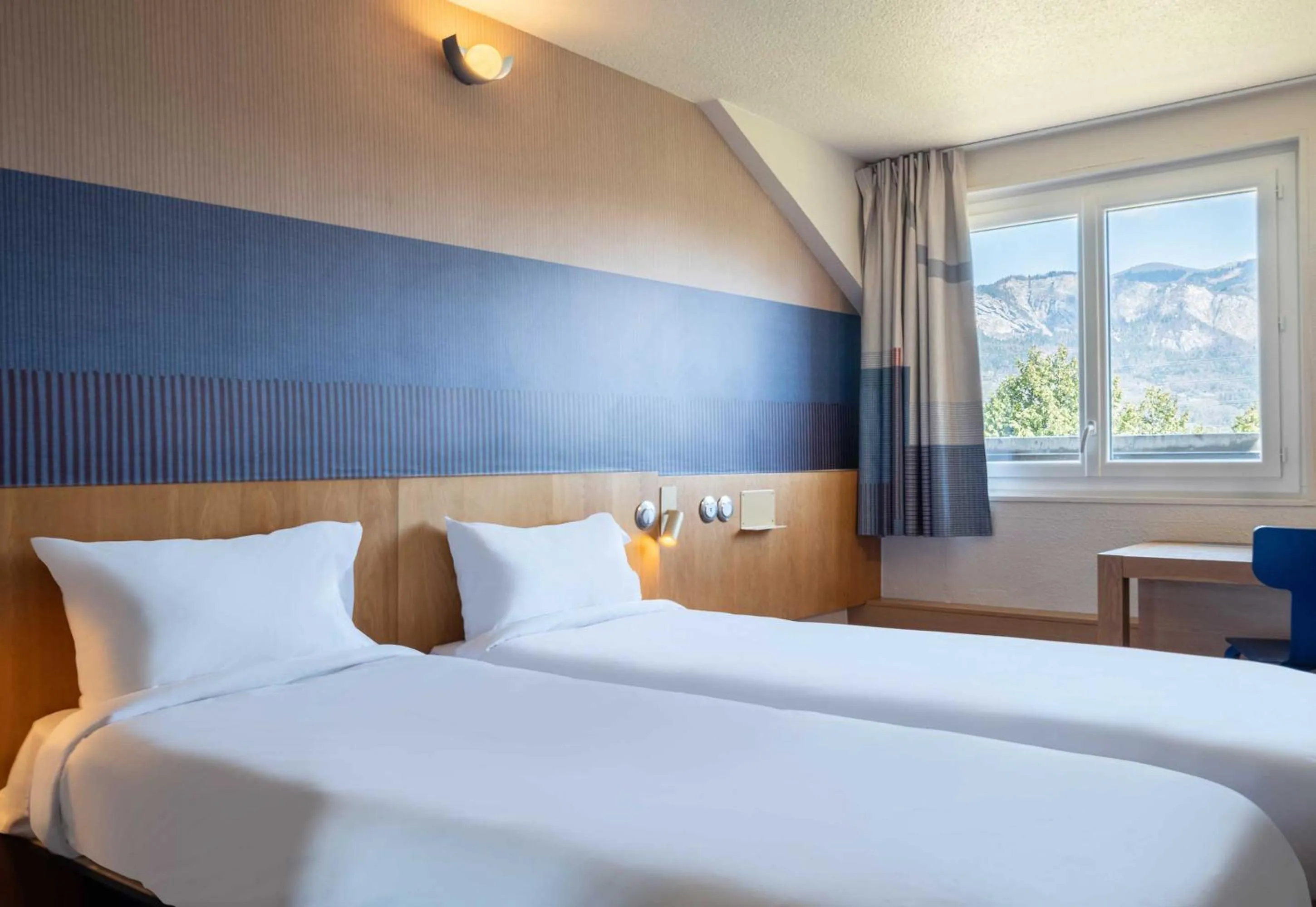 Photo of the whole room, Bed in B&B HOTEL Saint-Pierre-en-Faucigny Bonneville