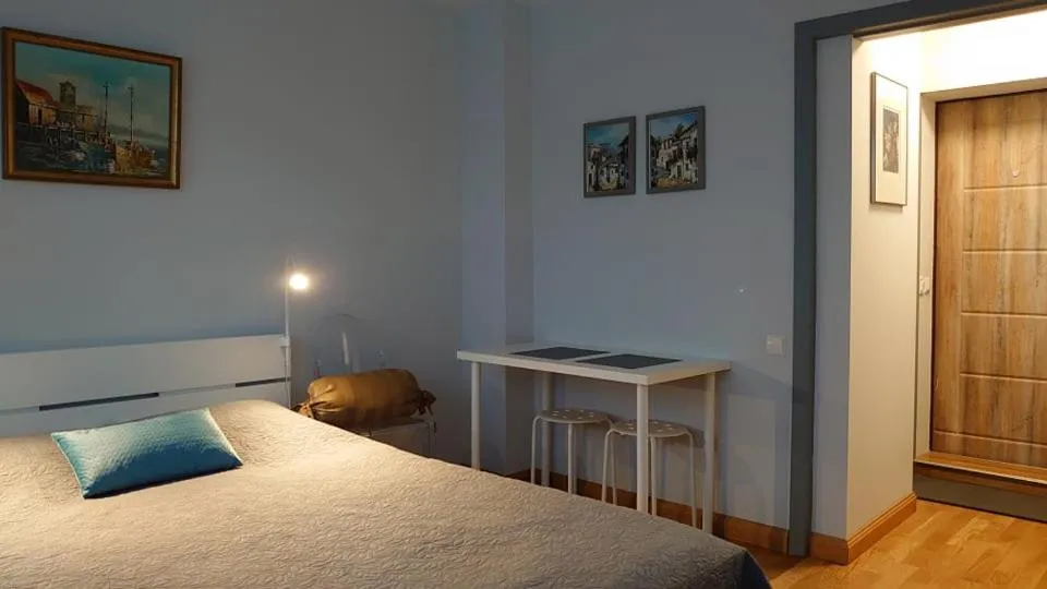 Bed in Karoso Apartment