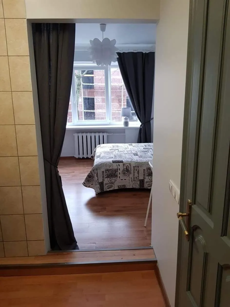 Bed in Karoso Apartment