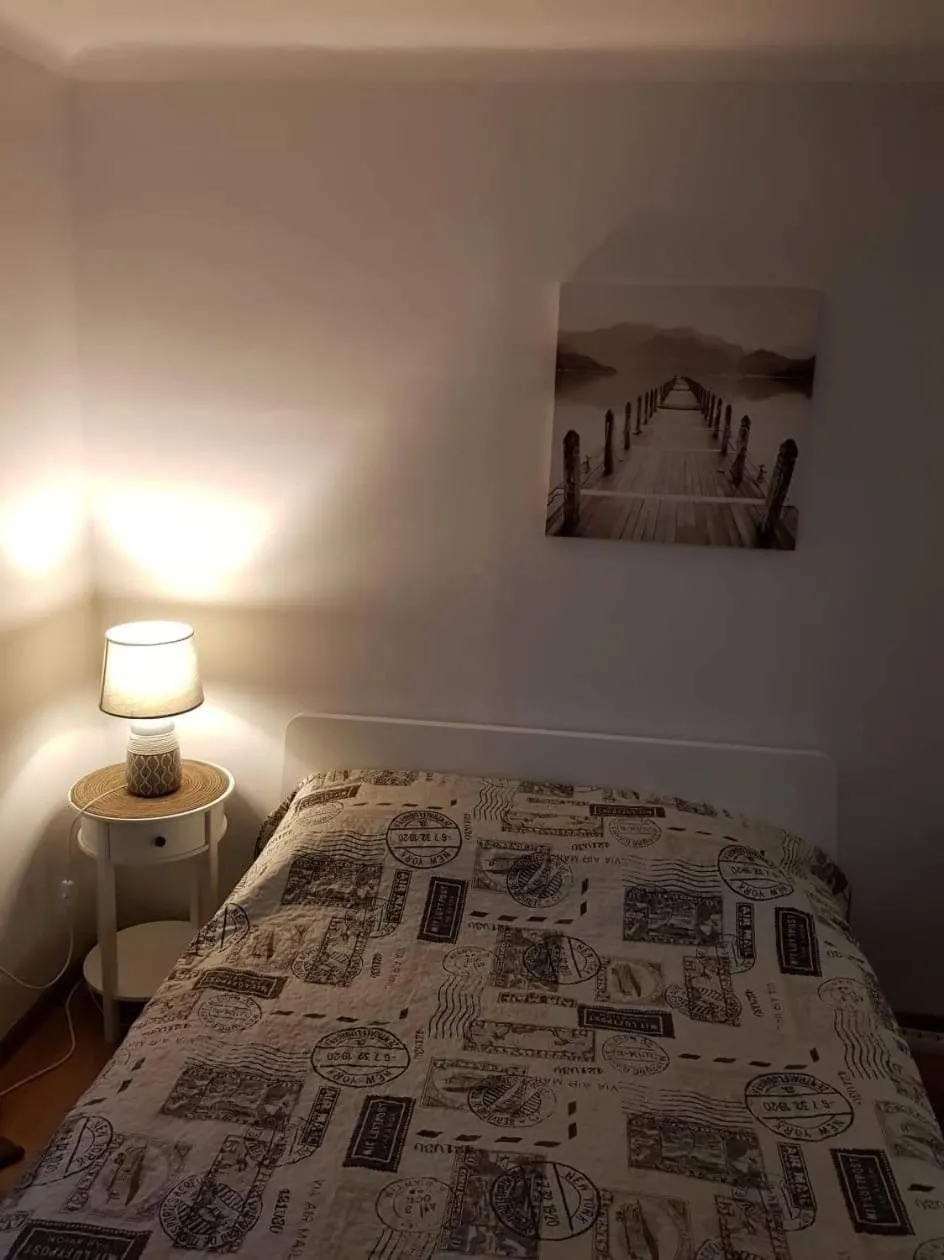 Bed in Karoso Apartment