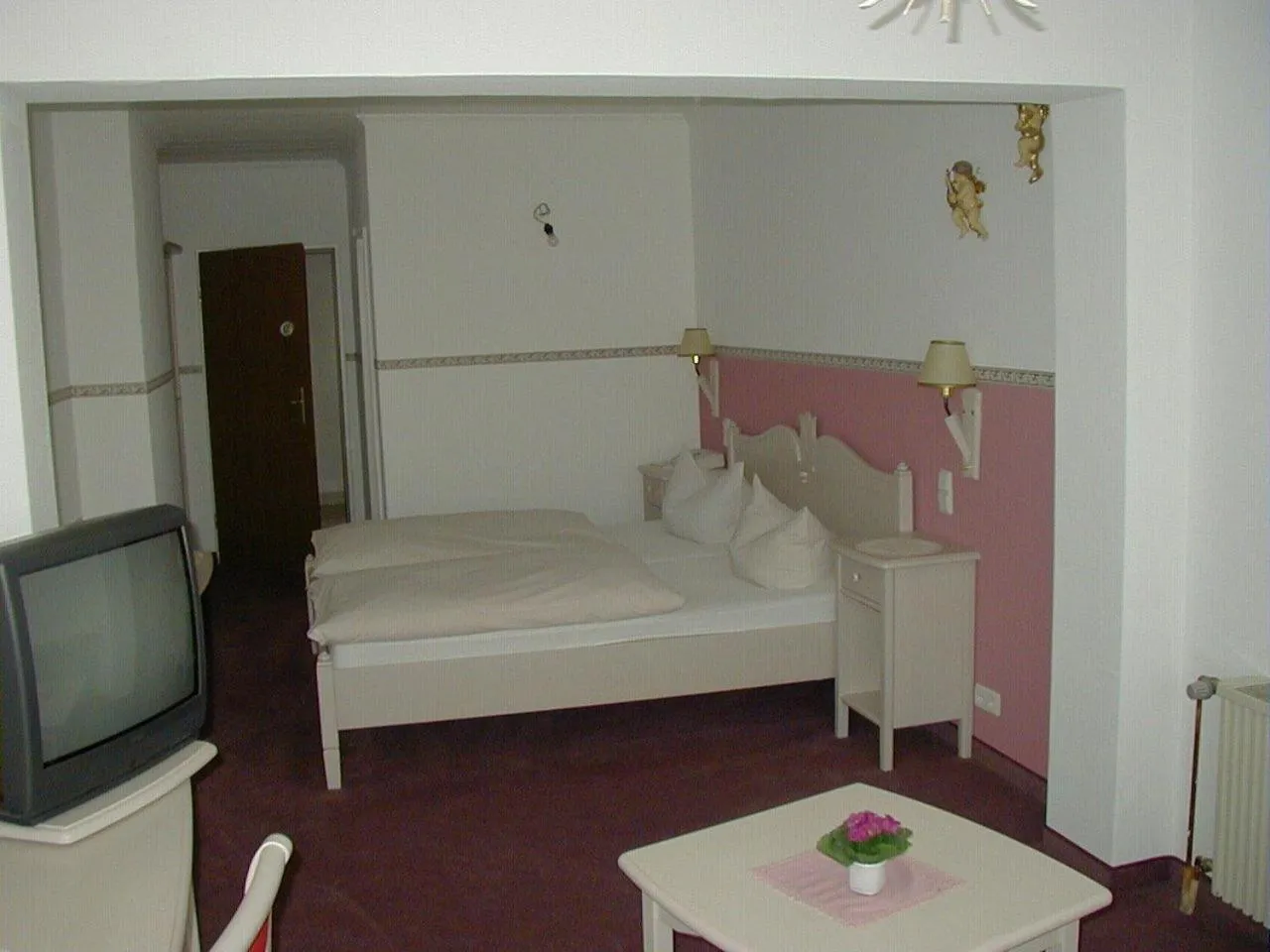 Photo of the whole room, Bed in Hotel Schlossgarten
