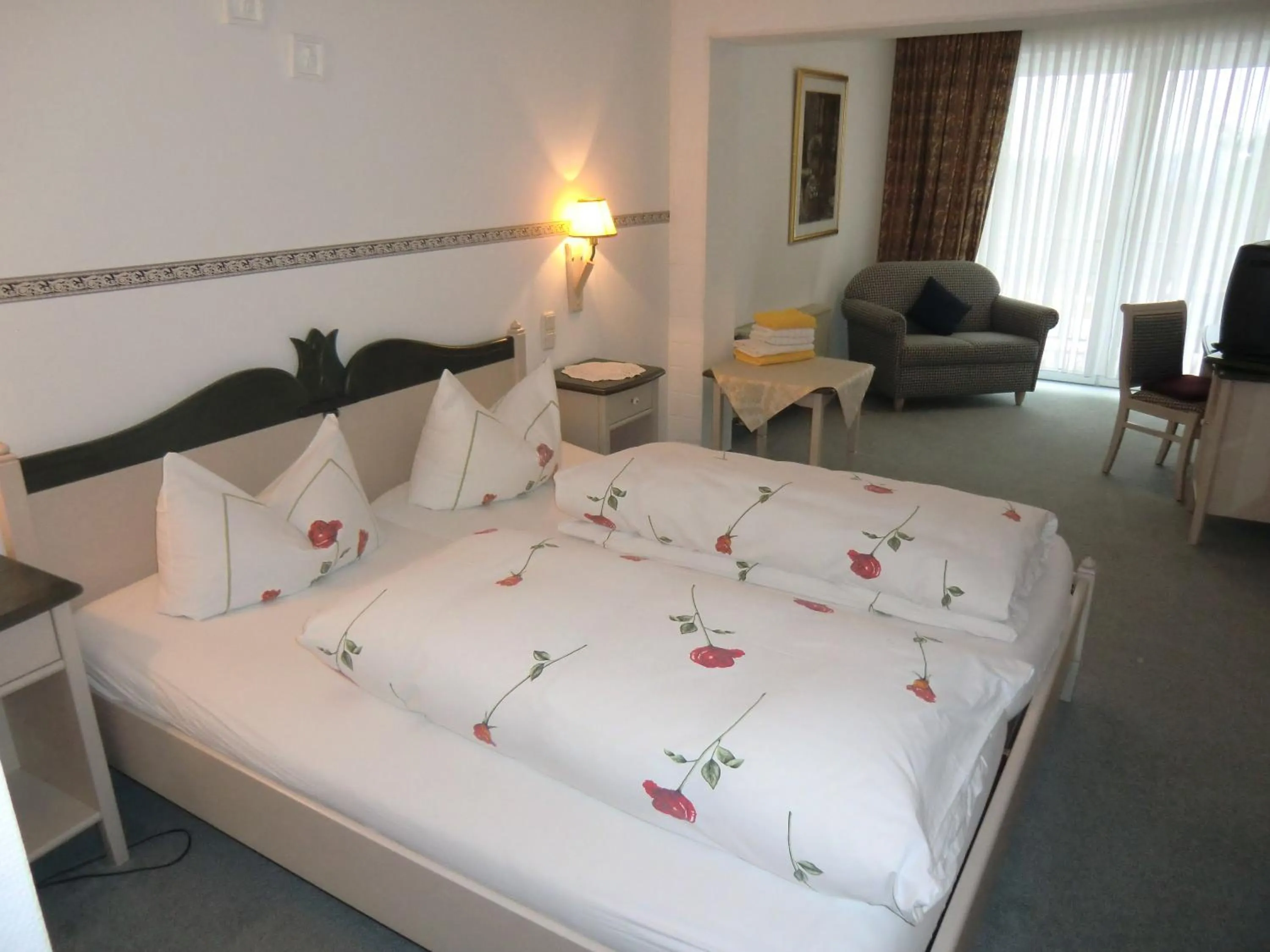 Photo of the whole room, Bed in Hotel Schlossgarten