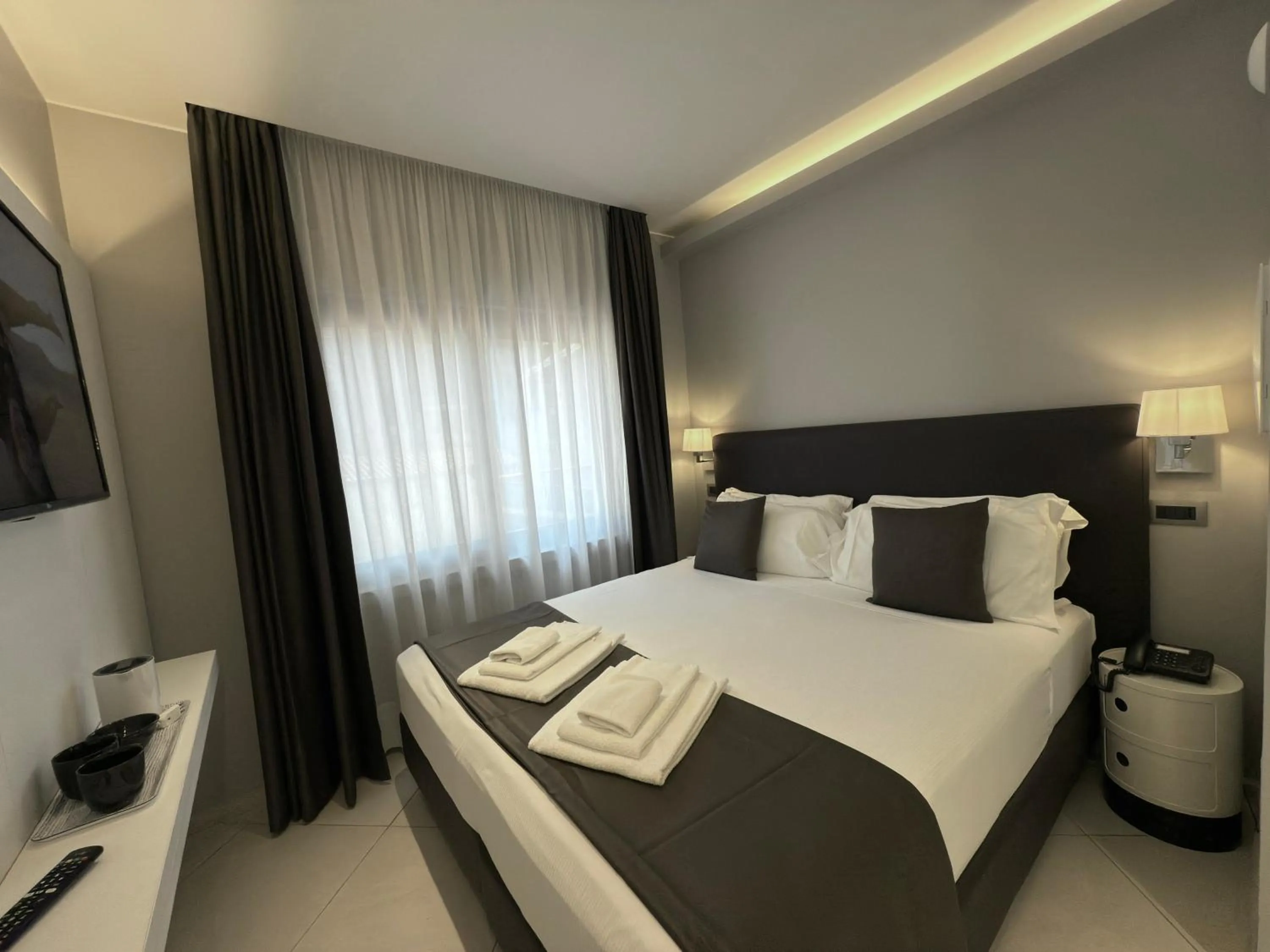 Bed in ETNEA STYLE CATANIA LUXURY ROOMS