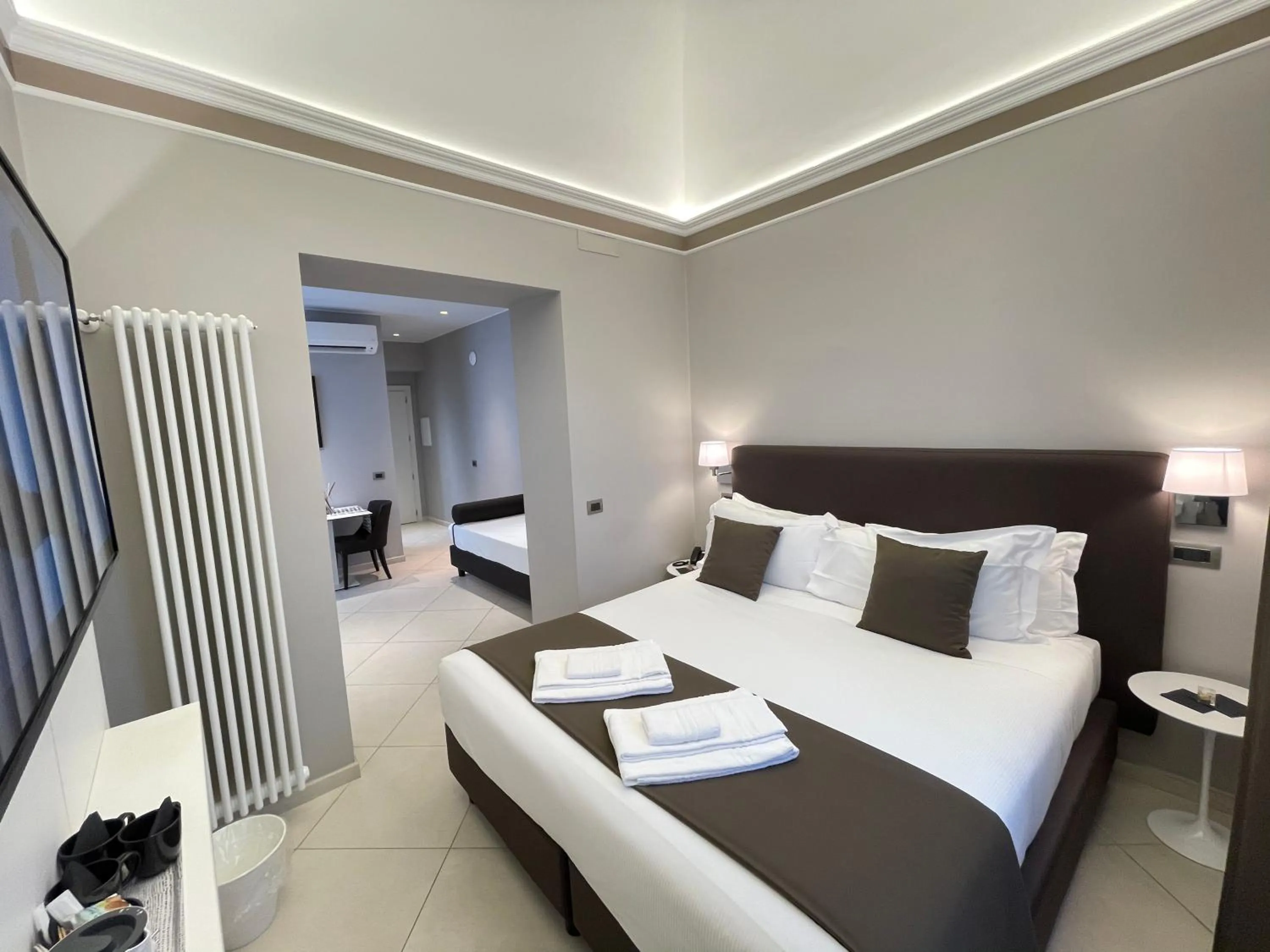 Bed in ETNEA STYLE CATANIA LUXURY ROOMS