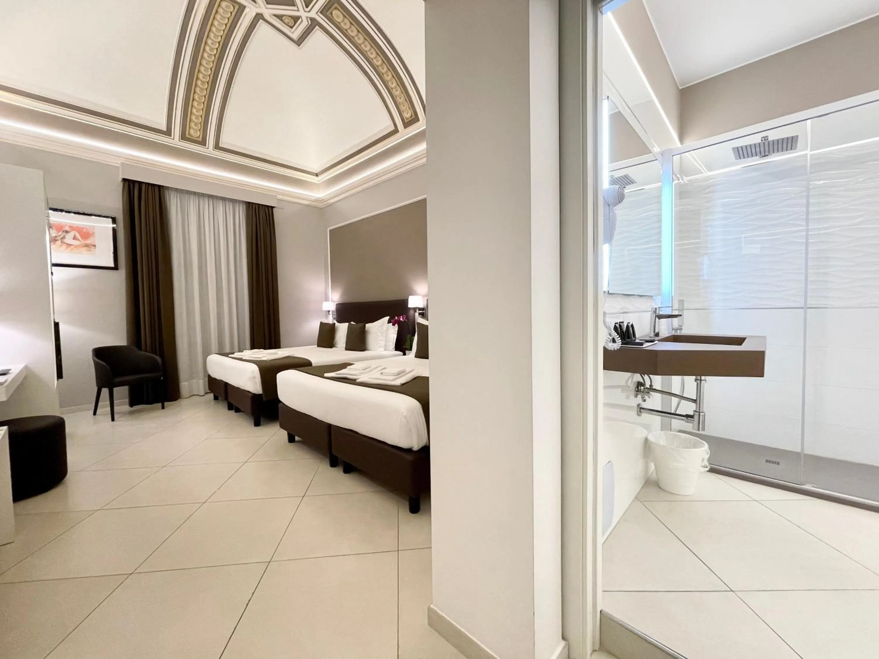 Bed in ETNEA STYLE CATANIA LUXURY ROOMS